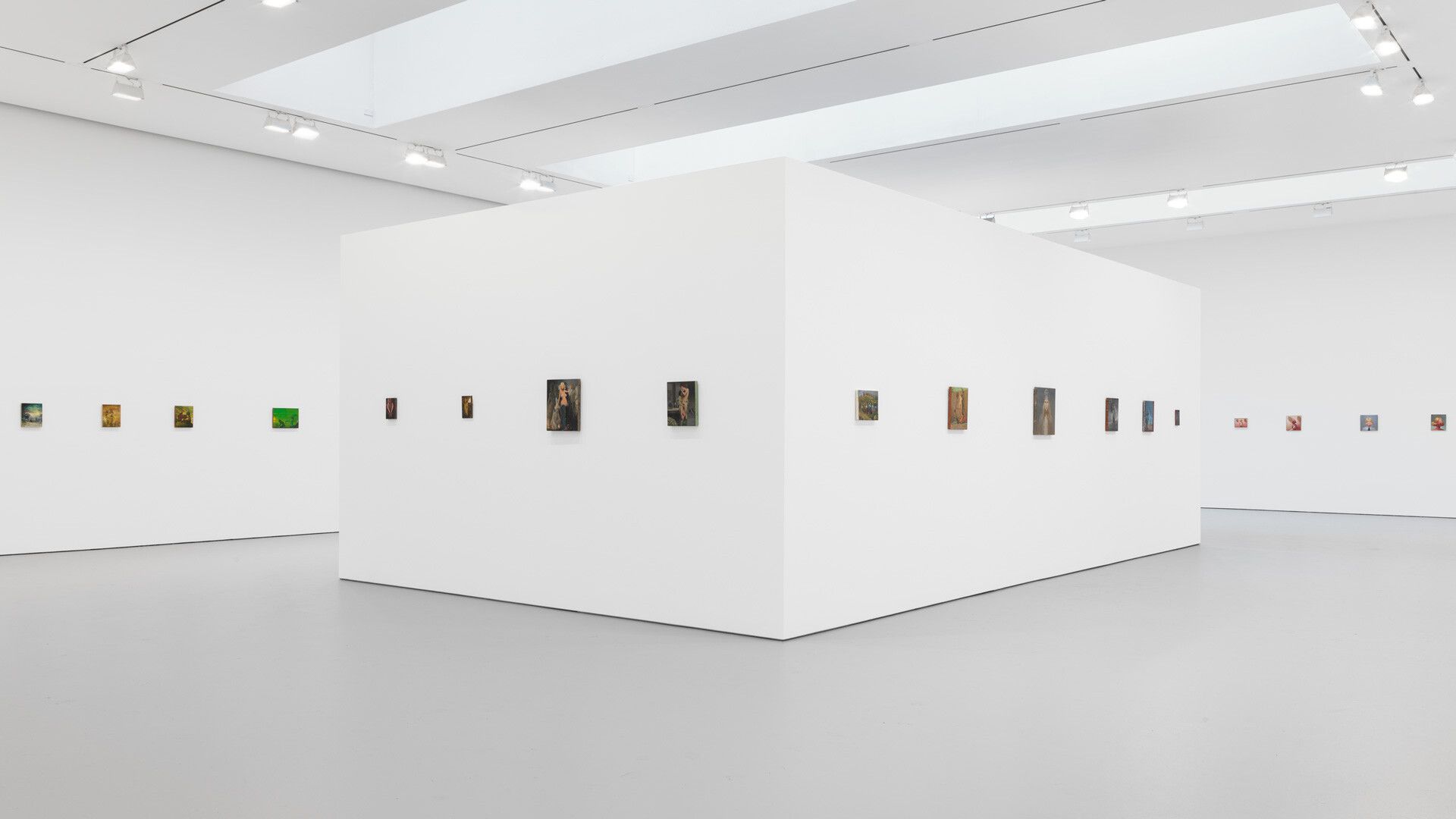An installation view featuring paintings by Lisa Yuskavage, dated 2018