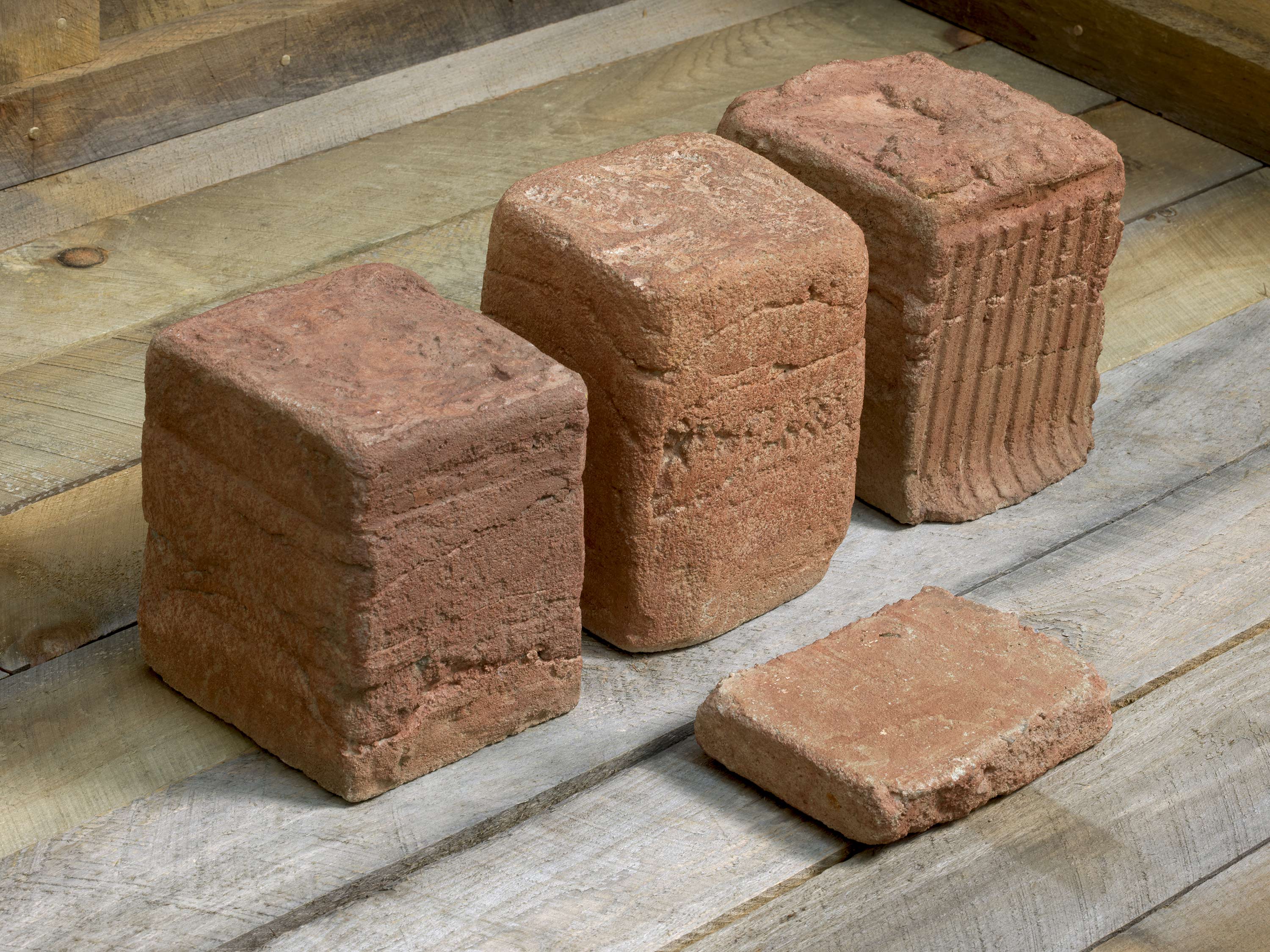 A detail from a concrete and paint sculpture by Beverly Buchanan, titled Wall Column, dated 1980.