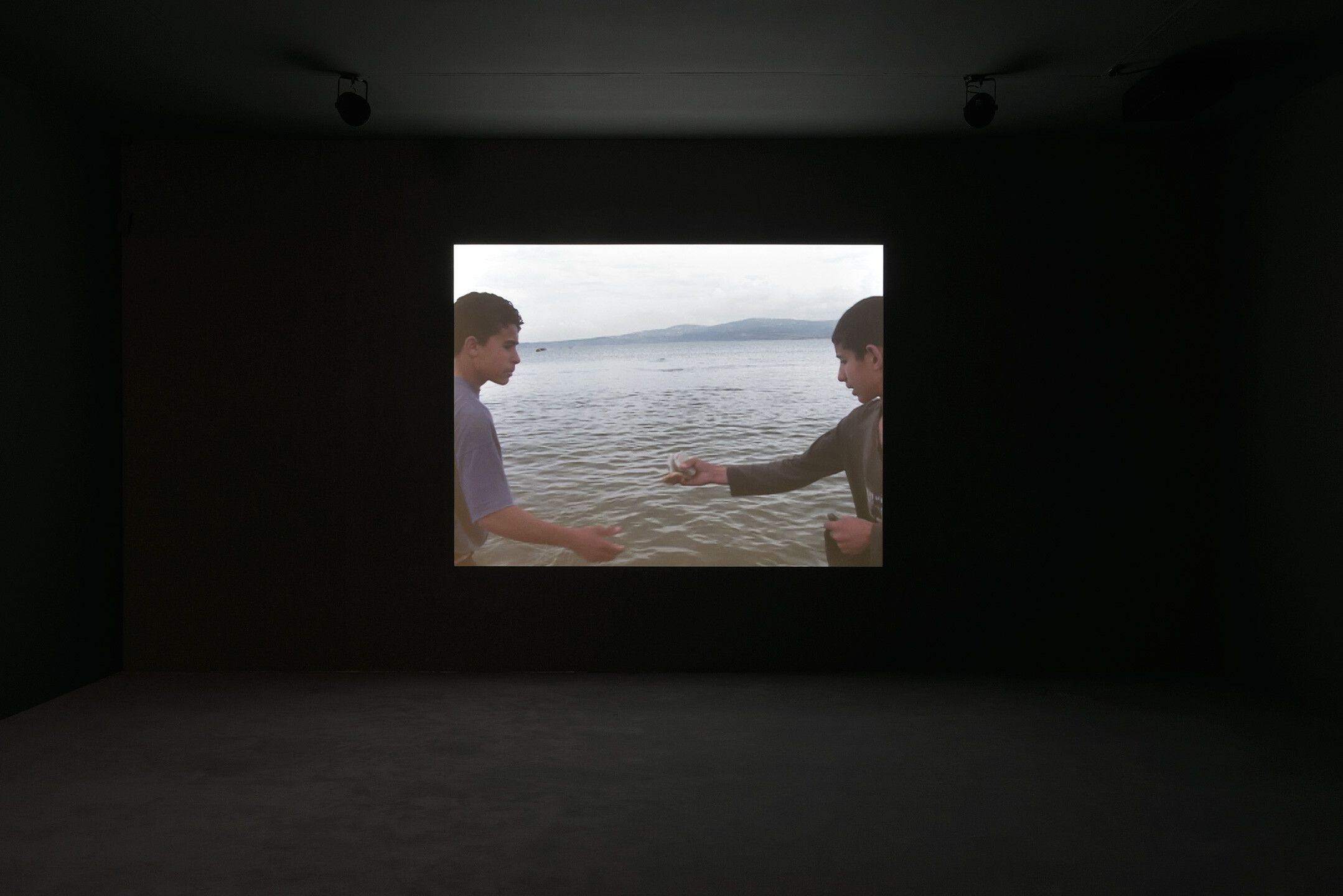 A video by Francis Alÿs in collaboration with Rafael Ortega, titled Children's Game #2: Ricochets Tangier, Morocco, dated 2007.