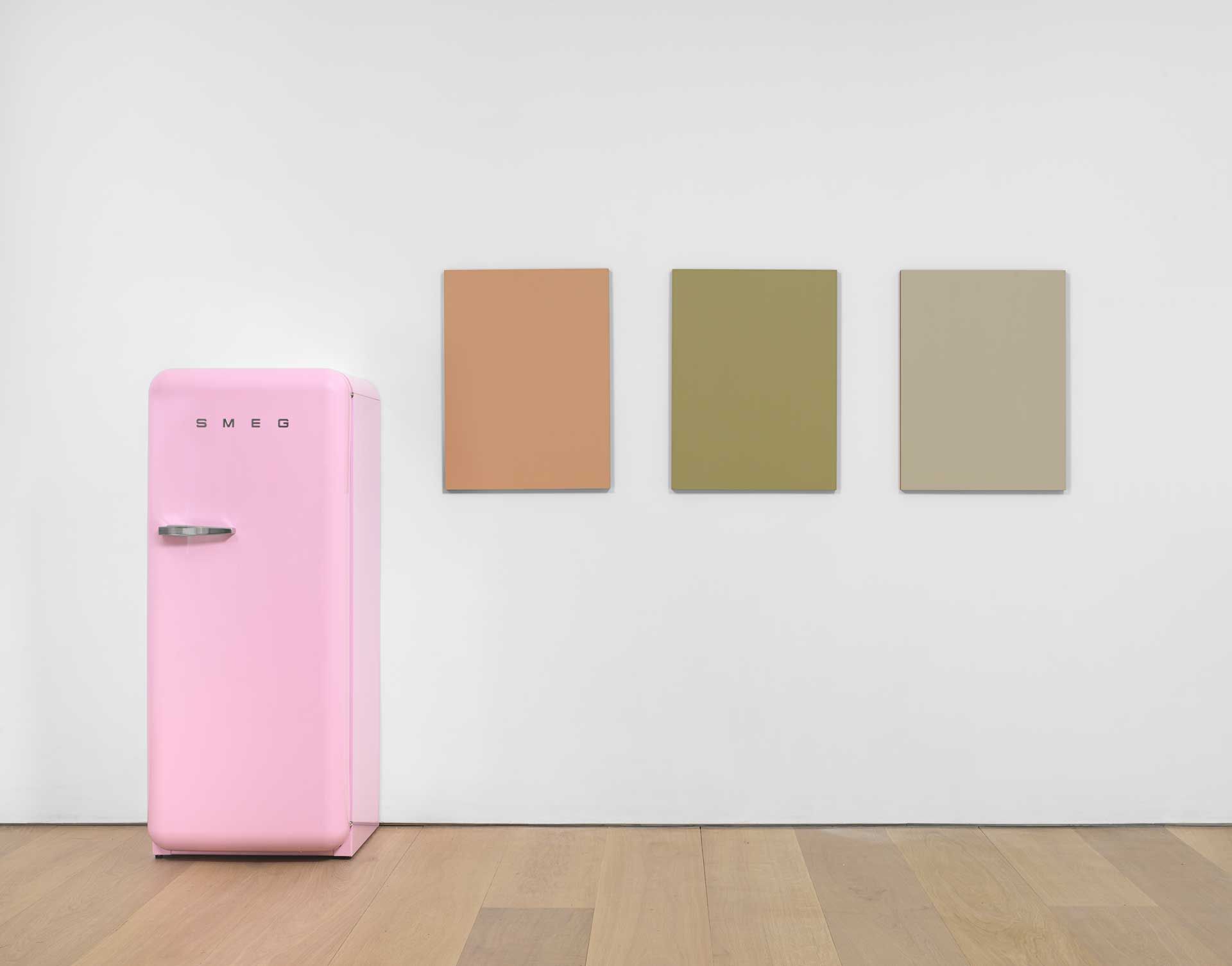 A work by Sherrie Levine comprised of Three oil on mahogany paintings and one SMEG 50s Retro Style refrigerator, titled Pink SMEG Refrigerator and Renoir Nudes, dated 2016.