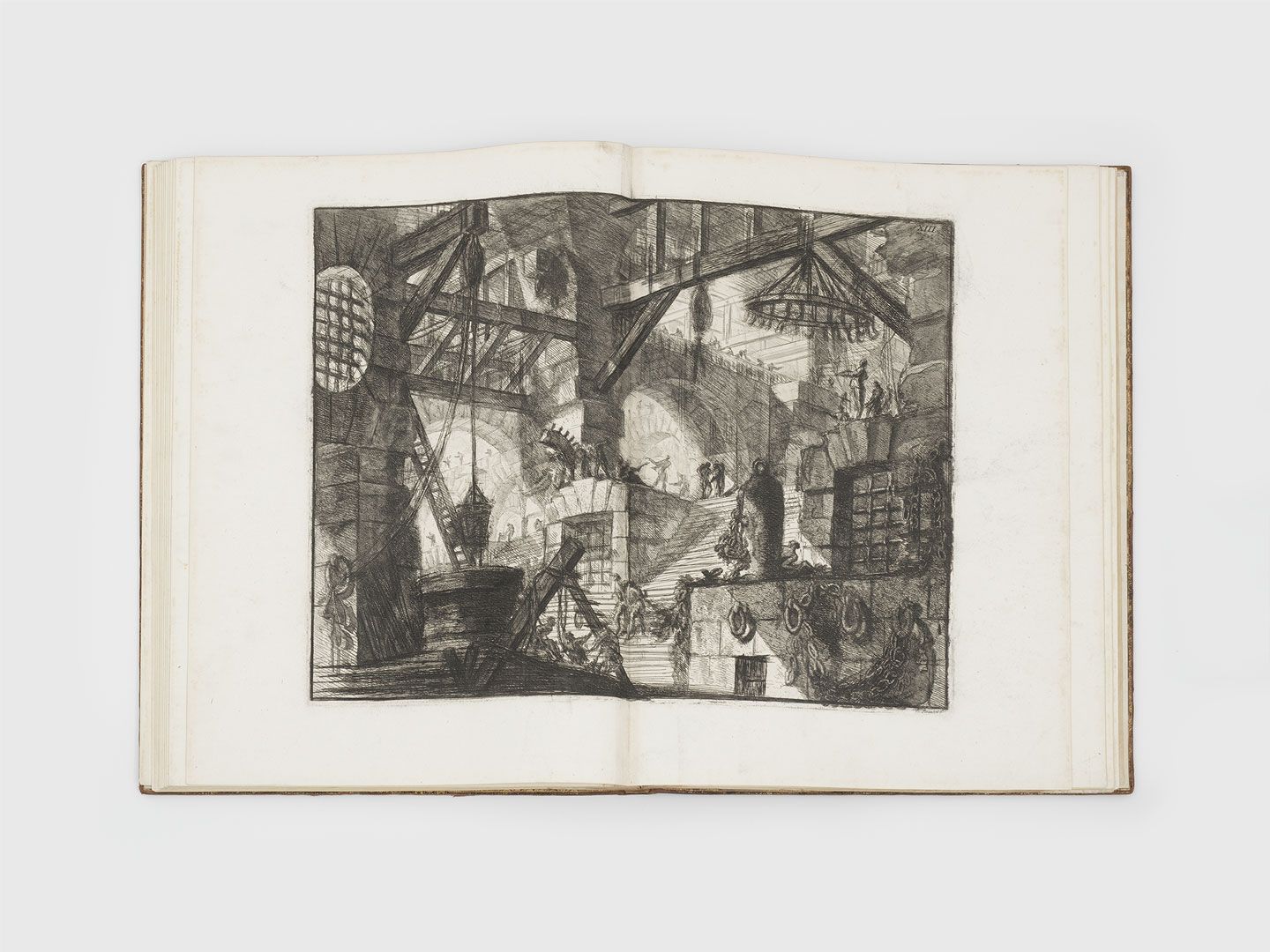 A print by Giovanni Battista Piranesi, titled Carceri d'invenzione, translated as Imaginary Prisons, dated in 1749 and 1761.