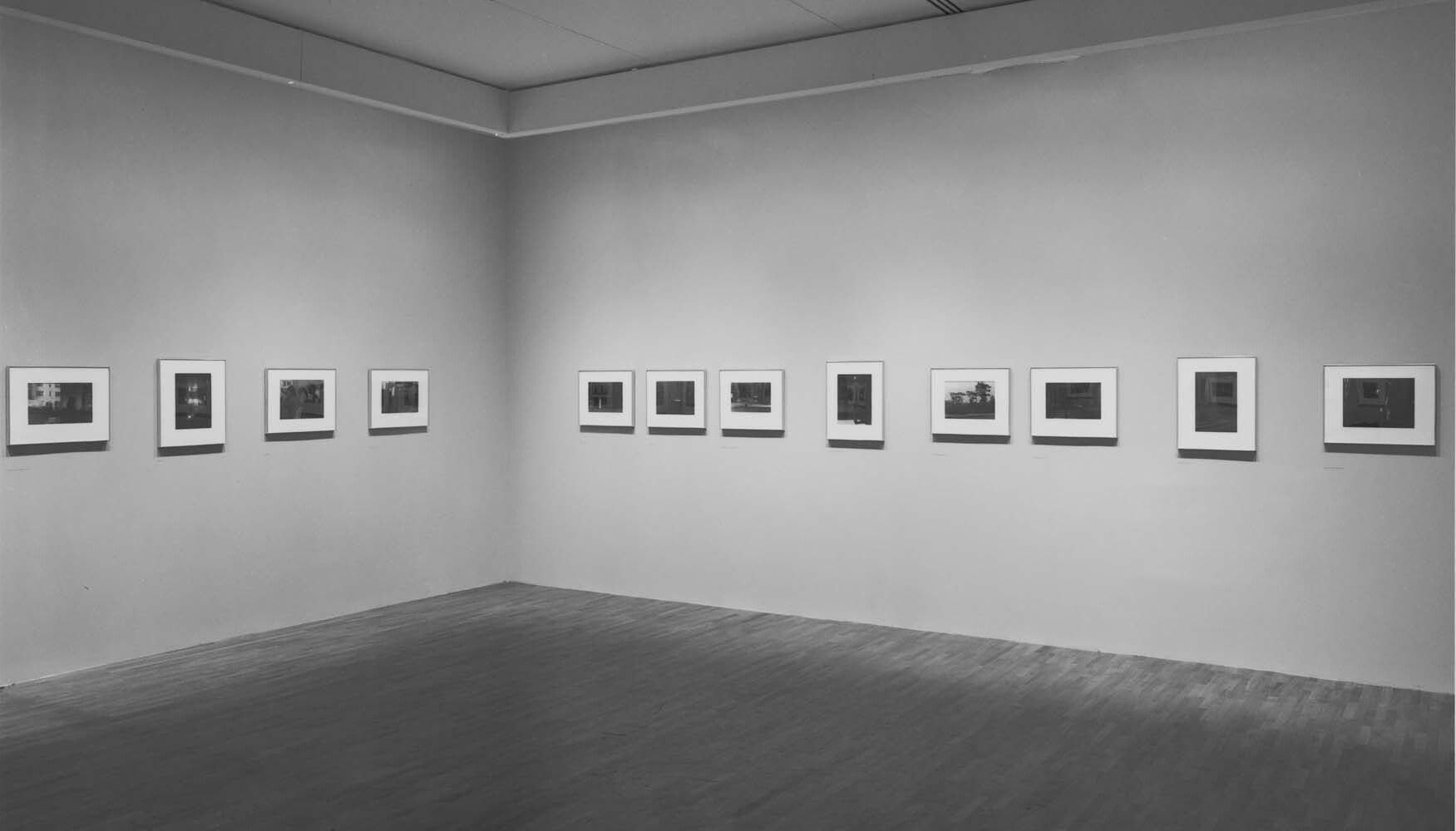 An installation view of an exhibition, titled Roy DeCarava: A Retrospective, at the Museum of Modern Art, New York, in 1996.
