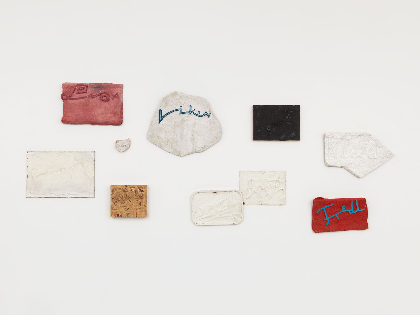 A mixed media work by Franz West, titled Namensbild West (Nameplate West), dated 1975 to 1985. 