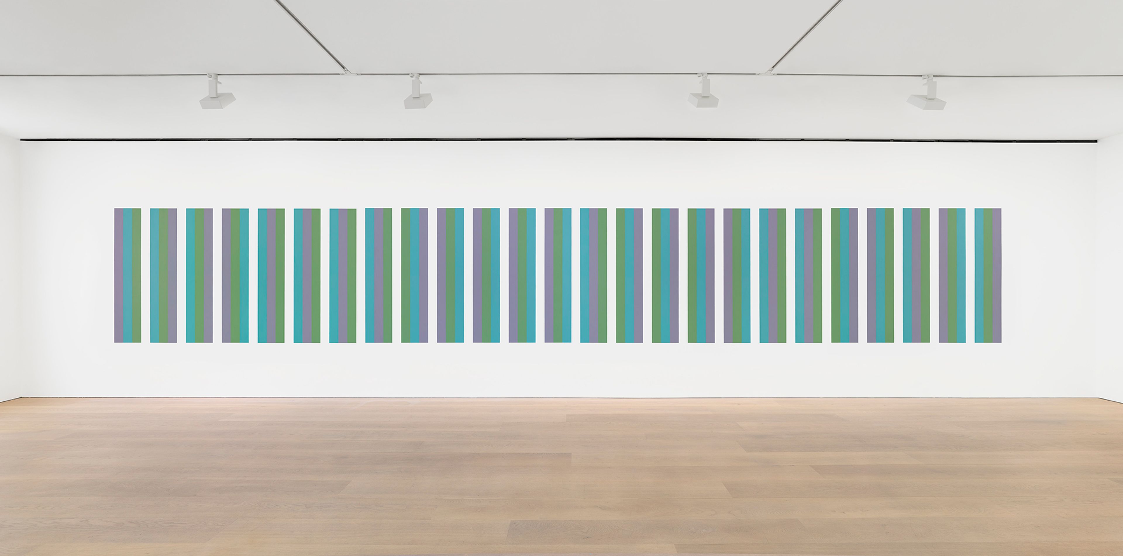 An installation view of a mural by Bridget Riley, titled Intervals Wall Painting, dated 2021.