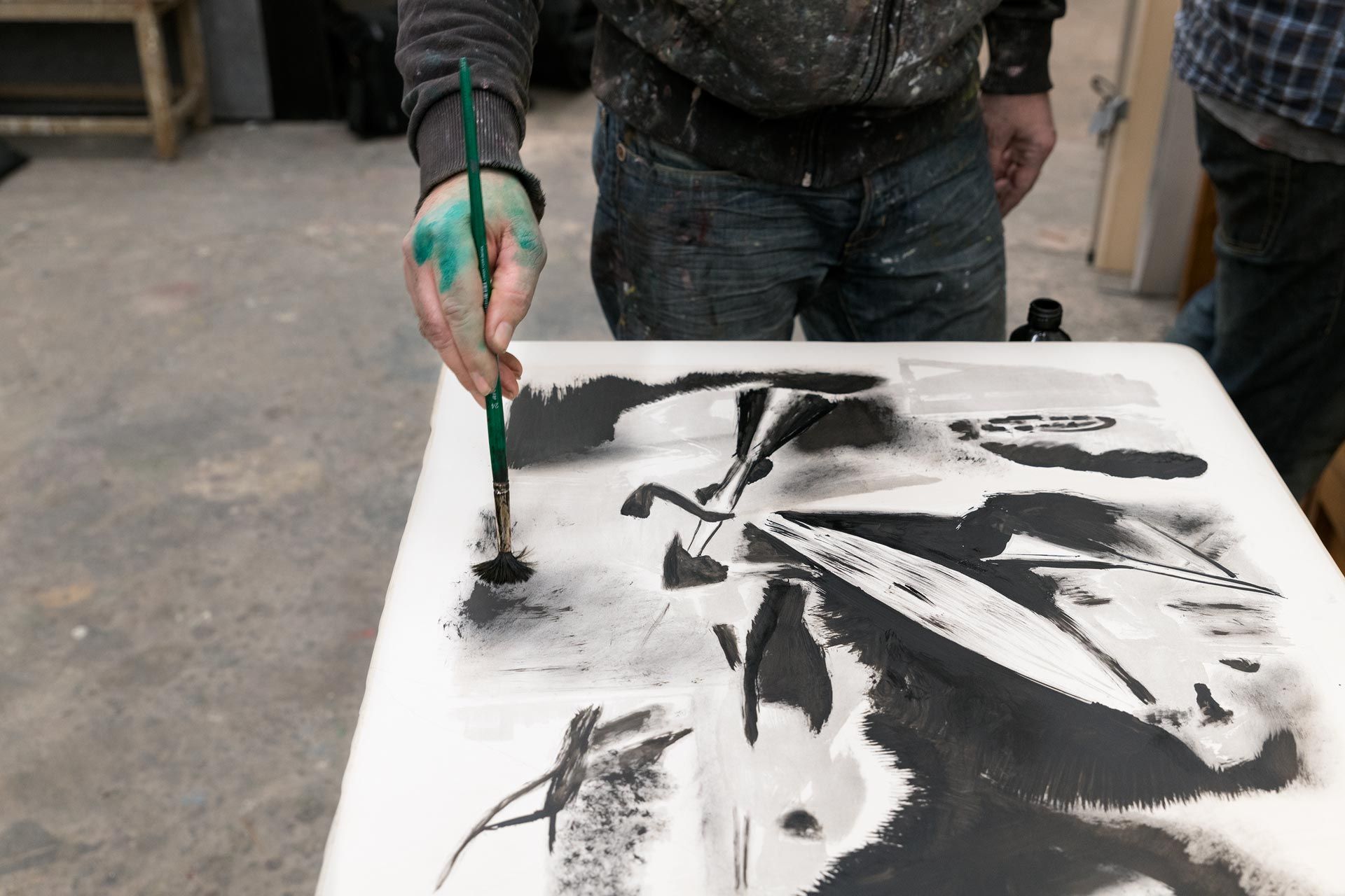 Neo Rauch paints on lithograph