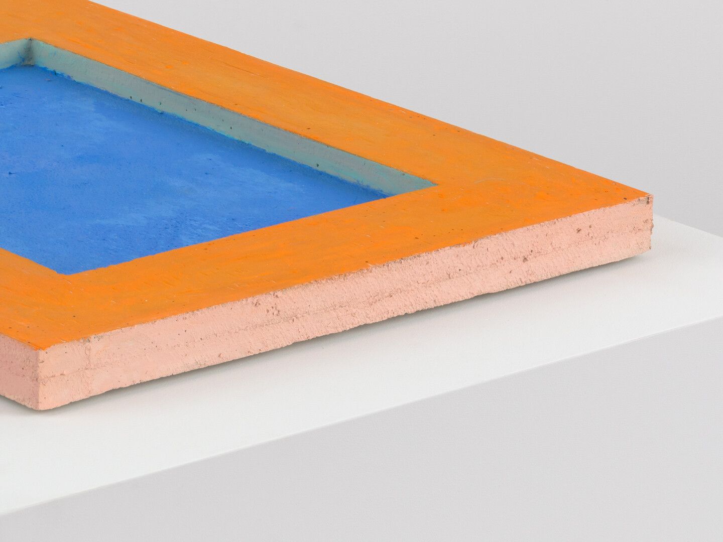 Detail view of an untitled oil stick on concrete sculpture by Harold Ancart, dated 2020.