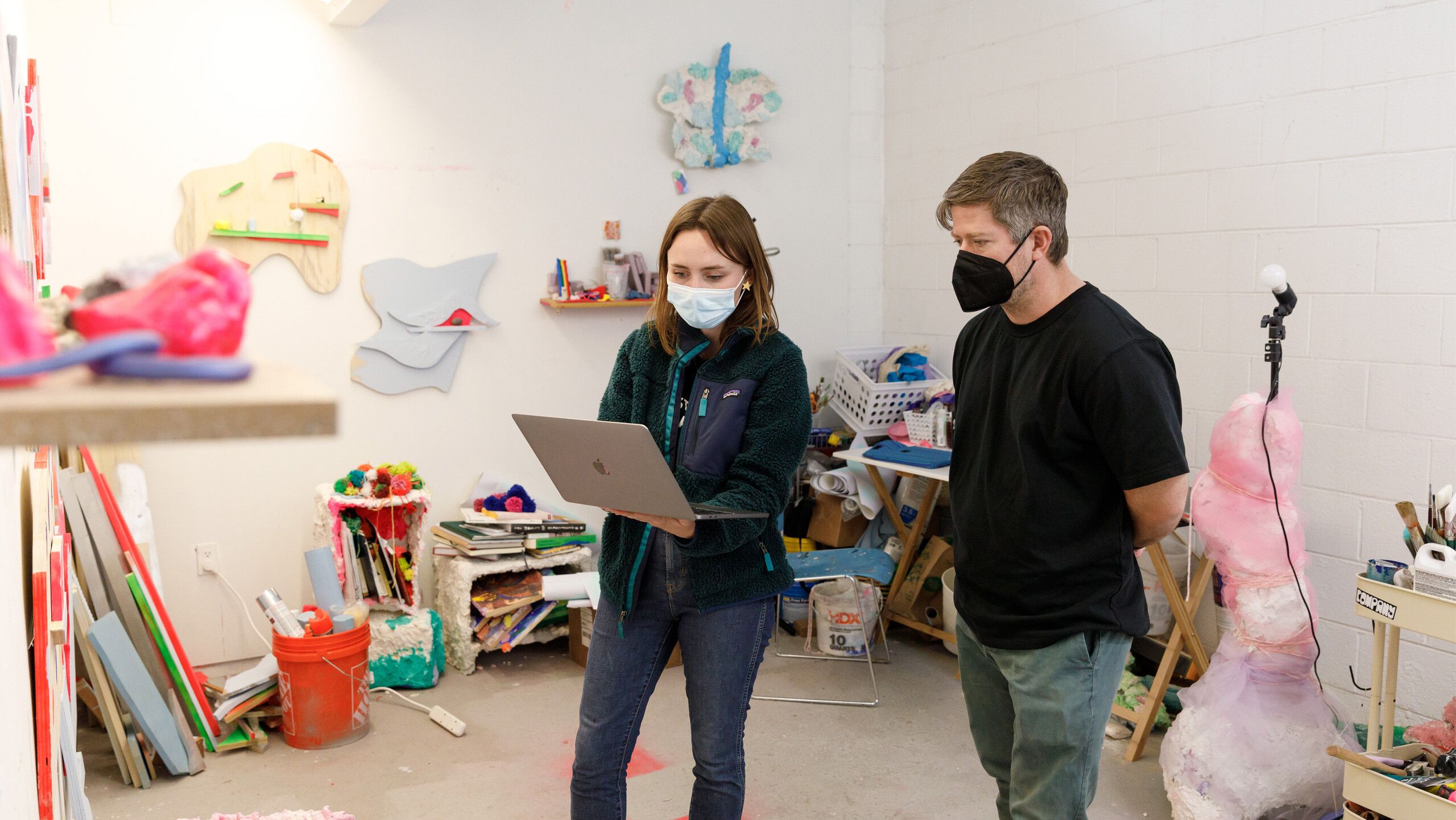 A photo of artist Nathan Hylden doing a studio visit with an ArtCenter GradArt student named Jane Christensen, dated 2022.