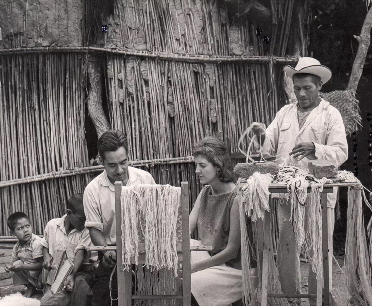 A photo of Sheila Hicks learning to knot with Rufino Reyes, in Oaxaca, Mexico, dated 1961.