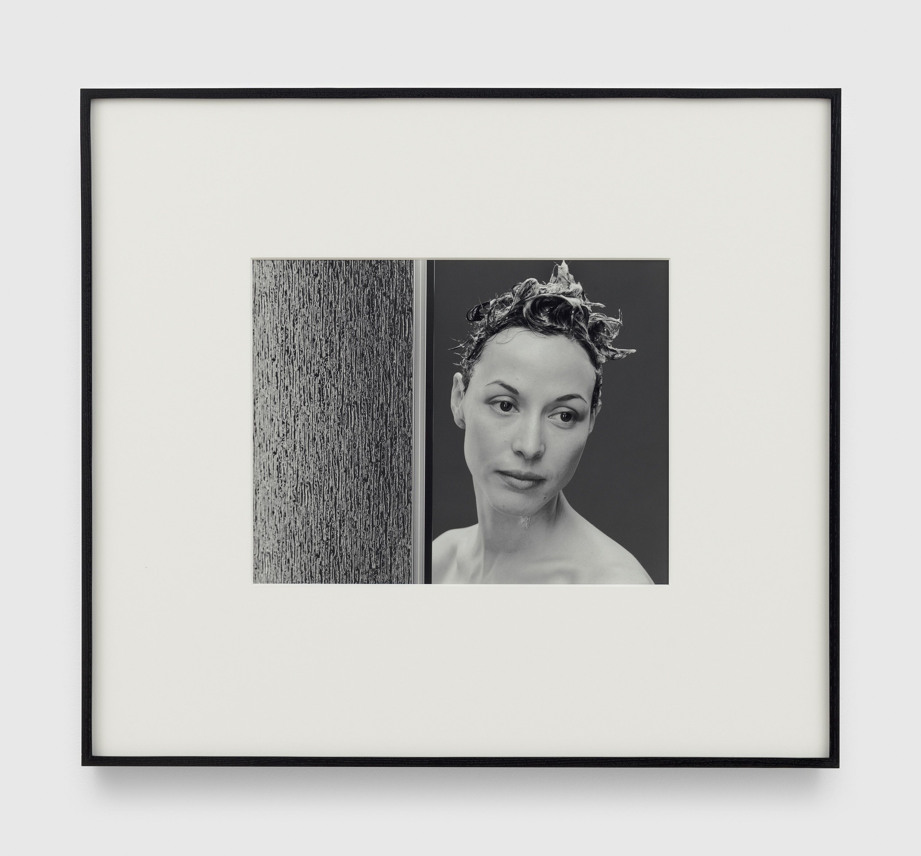 A photograph by Christopher Williams, titled Model # 105M - R59C Keystone Shower Door 57.4 x 59", Chrome / Raindrop SKU # 109149 # 96235. 970 - 084 - 000 (Meiko) Vancouver, B.C. Wednesday, April 6, 2005, dated 2005.