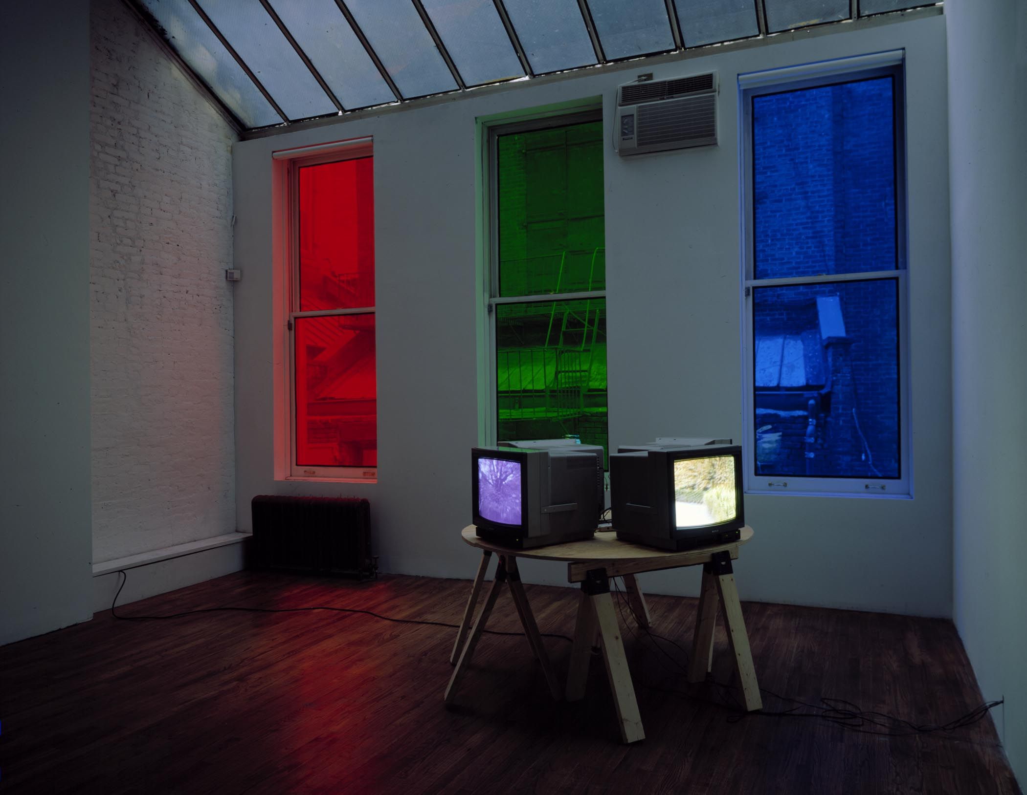 An installation view of the exhibition Diana Thater: China, Crayons & Molly Numbers 1 through 10, at David Zwirner New York, dated 1996.