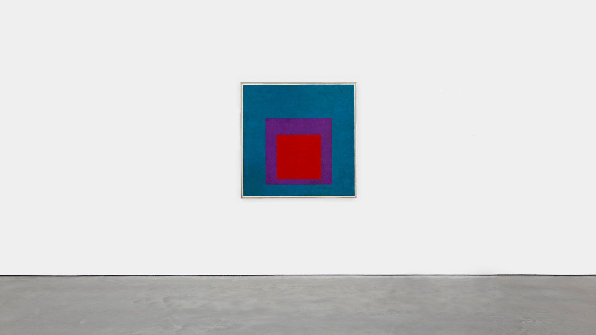 An installation view of a work by Josef Albers, titled Homage to the Square: Soaring, dated 1959.