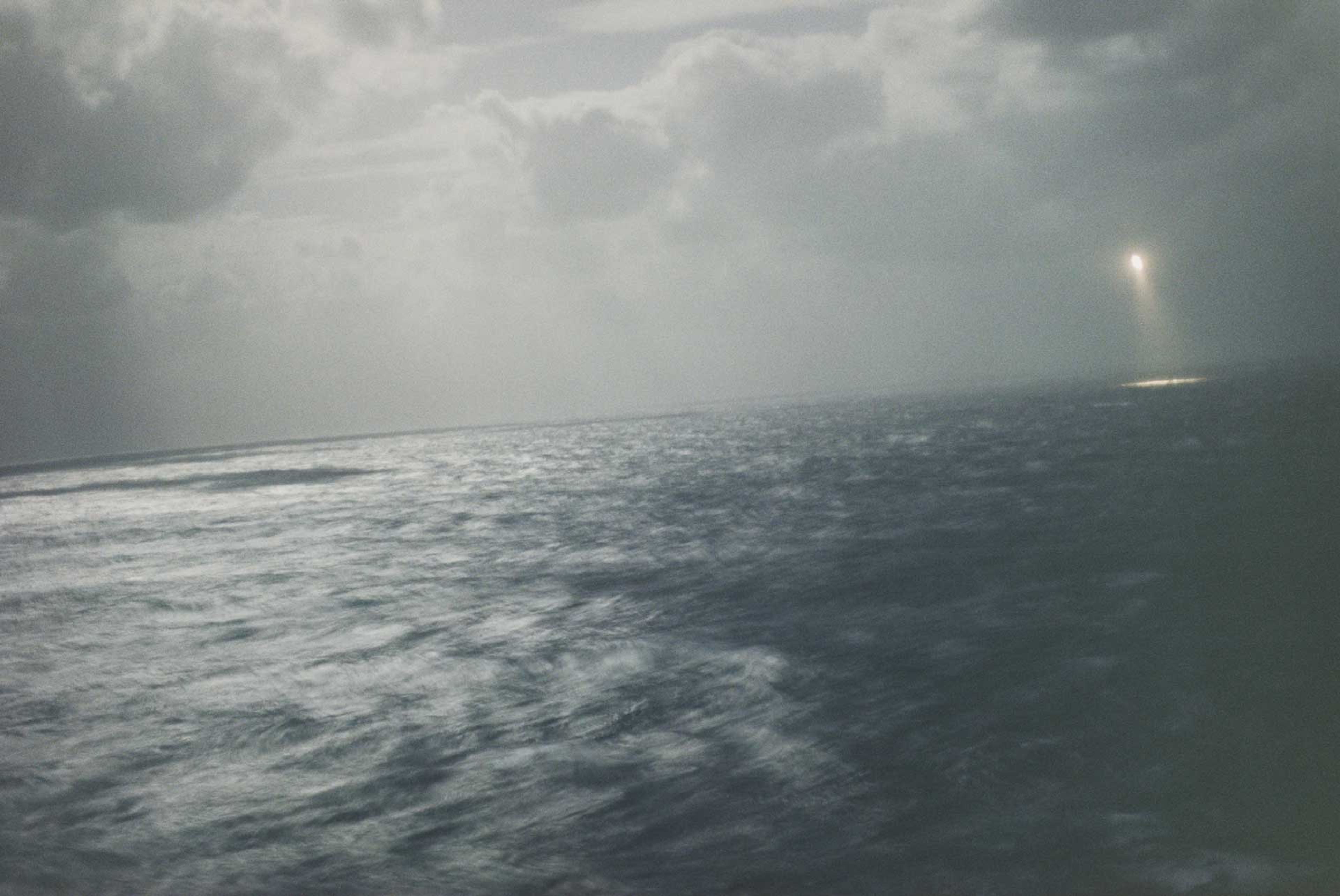 A photograph by Wolfgang Tillmans, titled Italian Coastal Guard Flying Rescue Mission off Lampedusa, dated 2008.