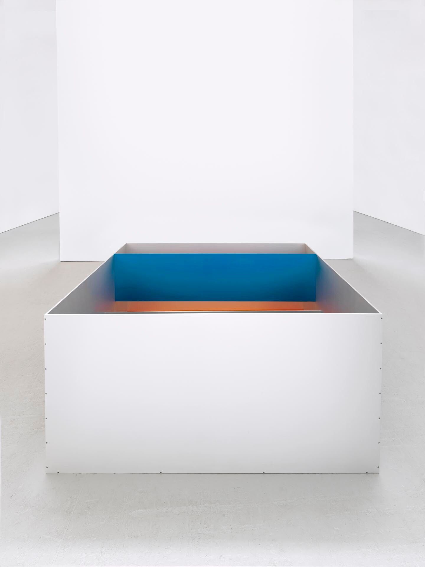 An untitled anodized aluminum and acrylic sheets sculpture by Donald Judd, dated 1989.