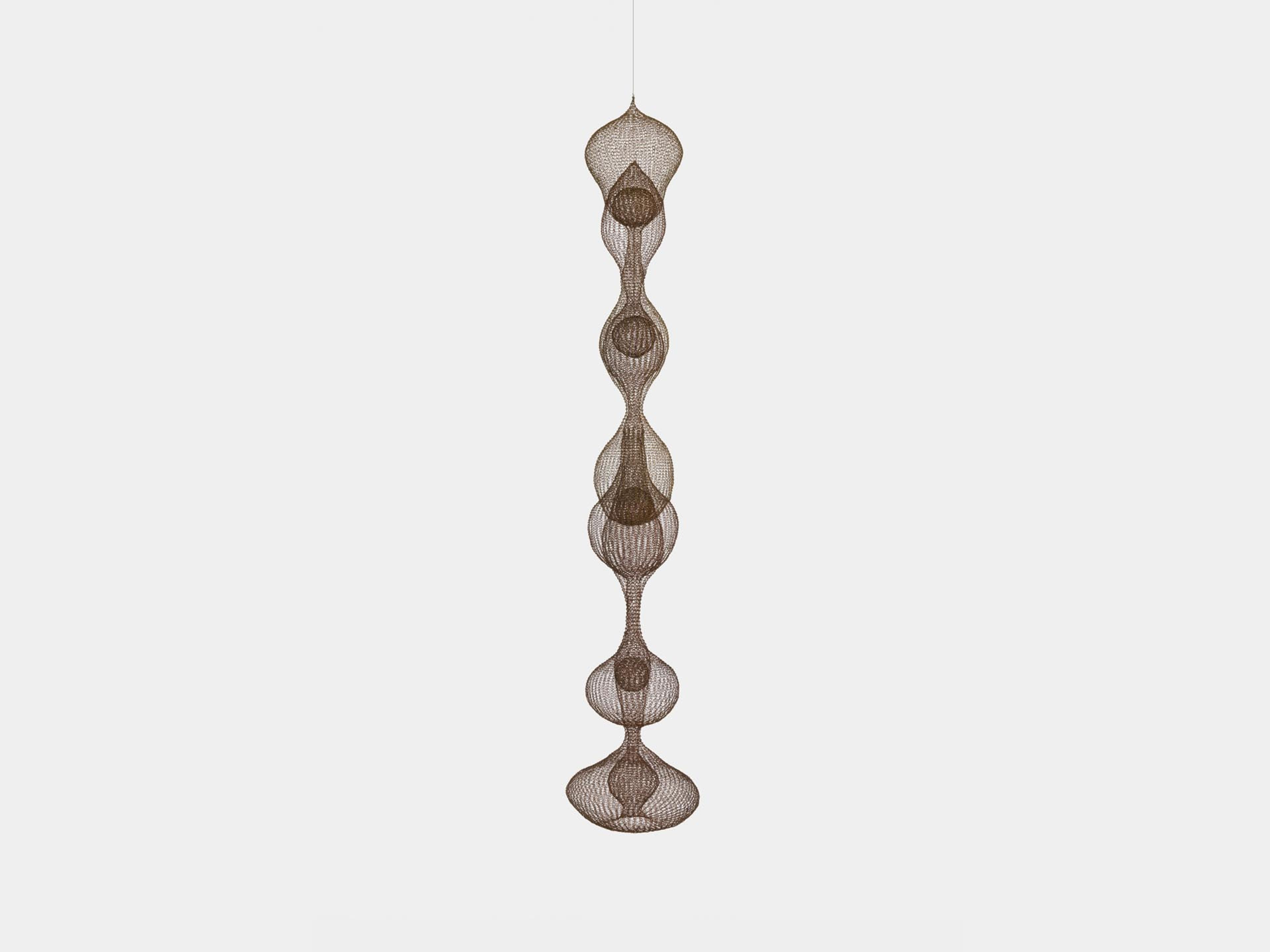 A sculpture by Ruth Asawa, titled Untitled (S.065, Hanging Seven-Lobed, Multi-Layer Continuous Form within a Form), dated circa 1960 to 1963.