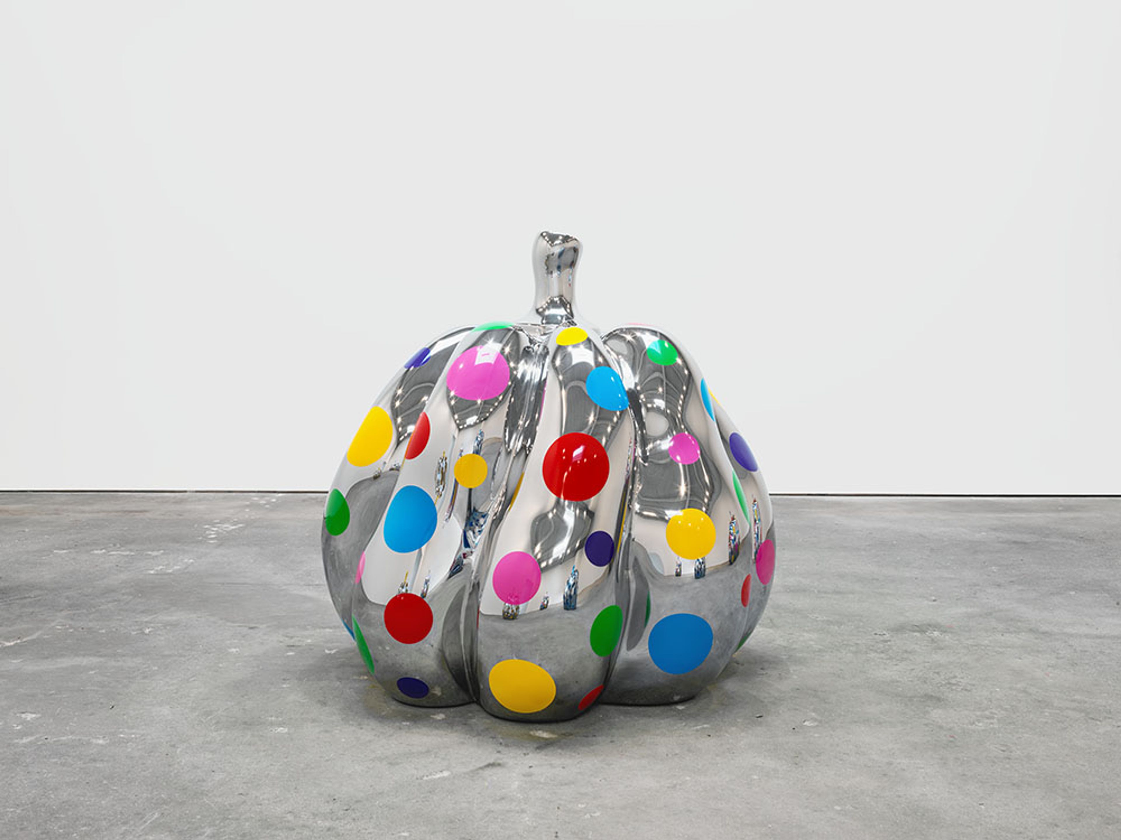 A sculpture by Yayoi Kusama, titled PUMPKIN, dated 2015.