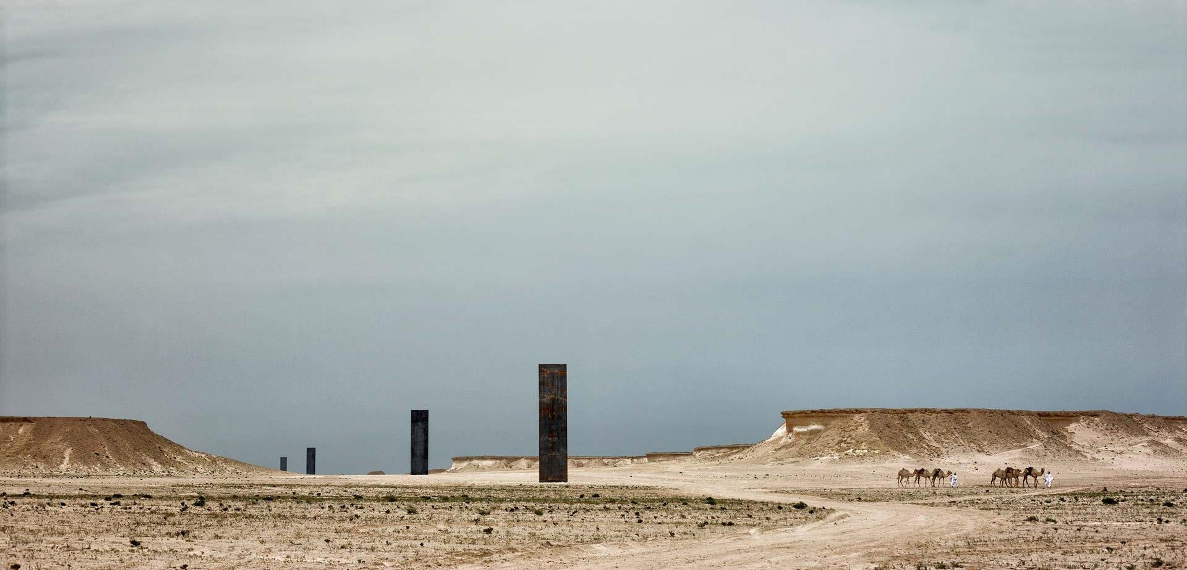 A four-part steel sculpture by Richard Serra, titled East-West/West-East, dated 2014