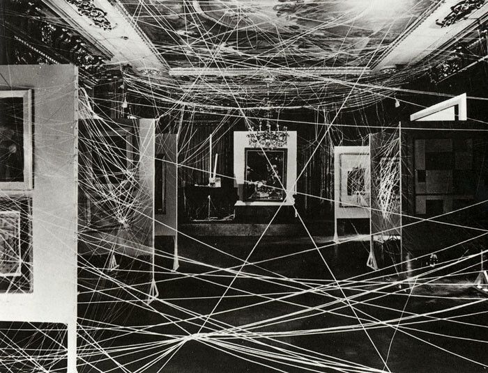 A photo of an installation by Marcel Duchamp, titled Sixteen Miles of String, in the show First Papers of Surrealism, in 1942.