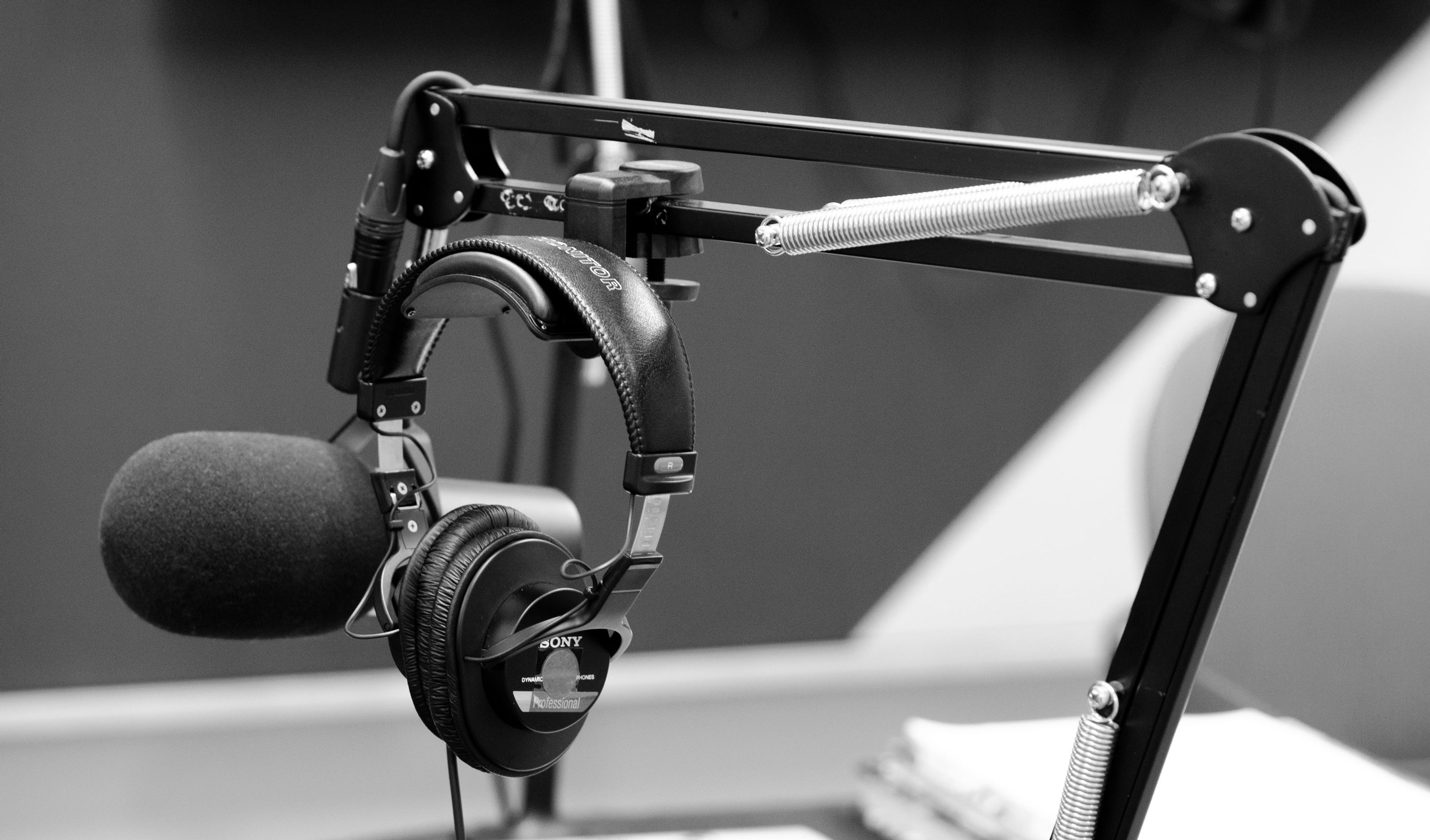 A photograph of microphones in a recording studio.