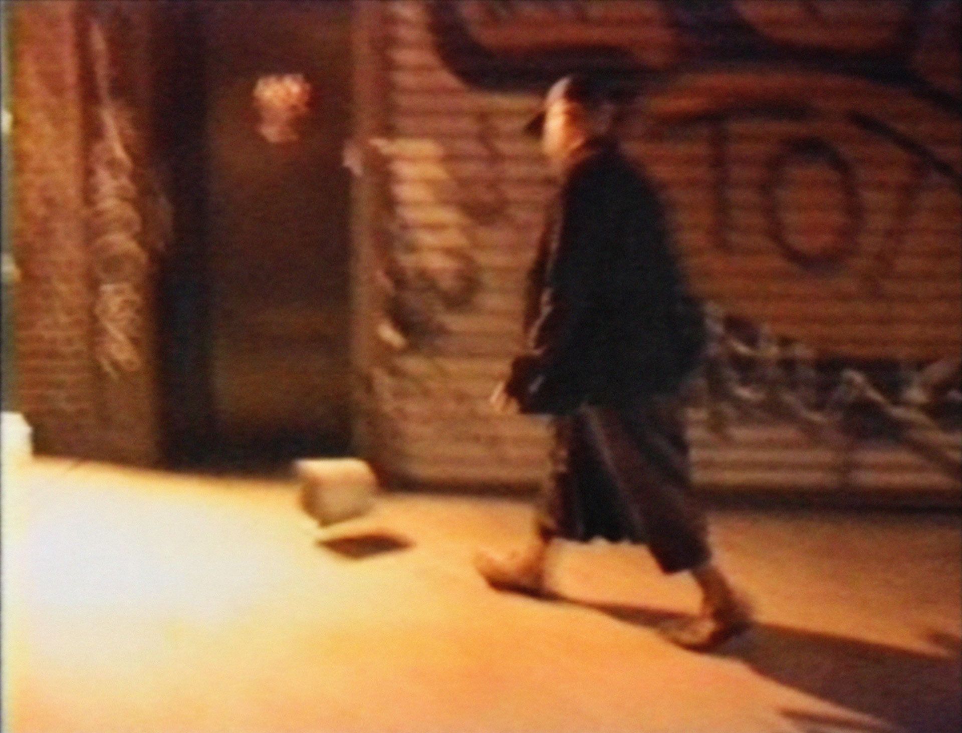 A still from a film by David Hammons, titled¬†Phat Free, dated 1995 to 1999. 