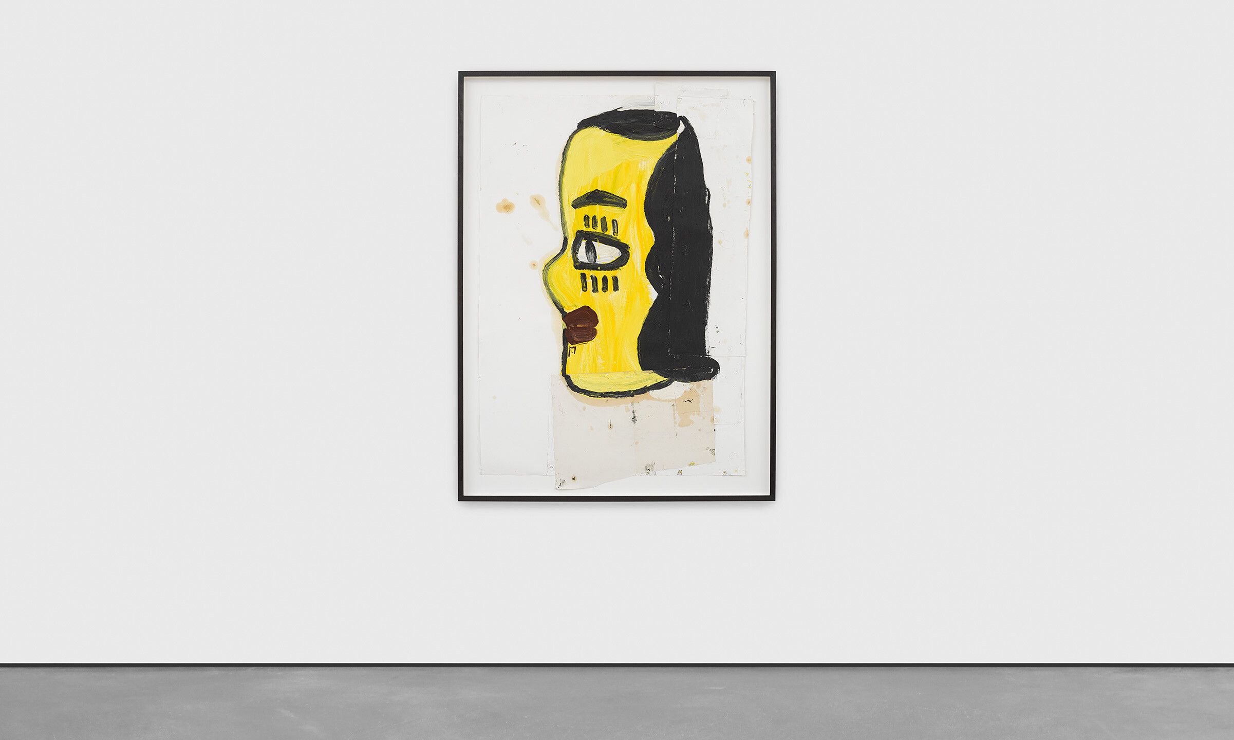 An installation view of a collage on paper by Rose Wylie, titled Yellow Head II (ordinary person), dated 2020.