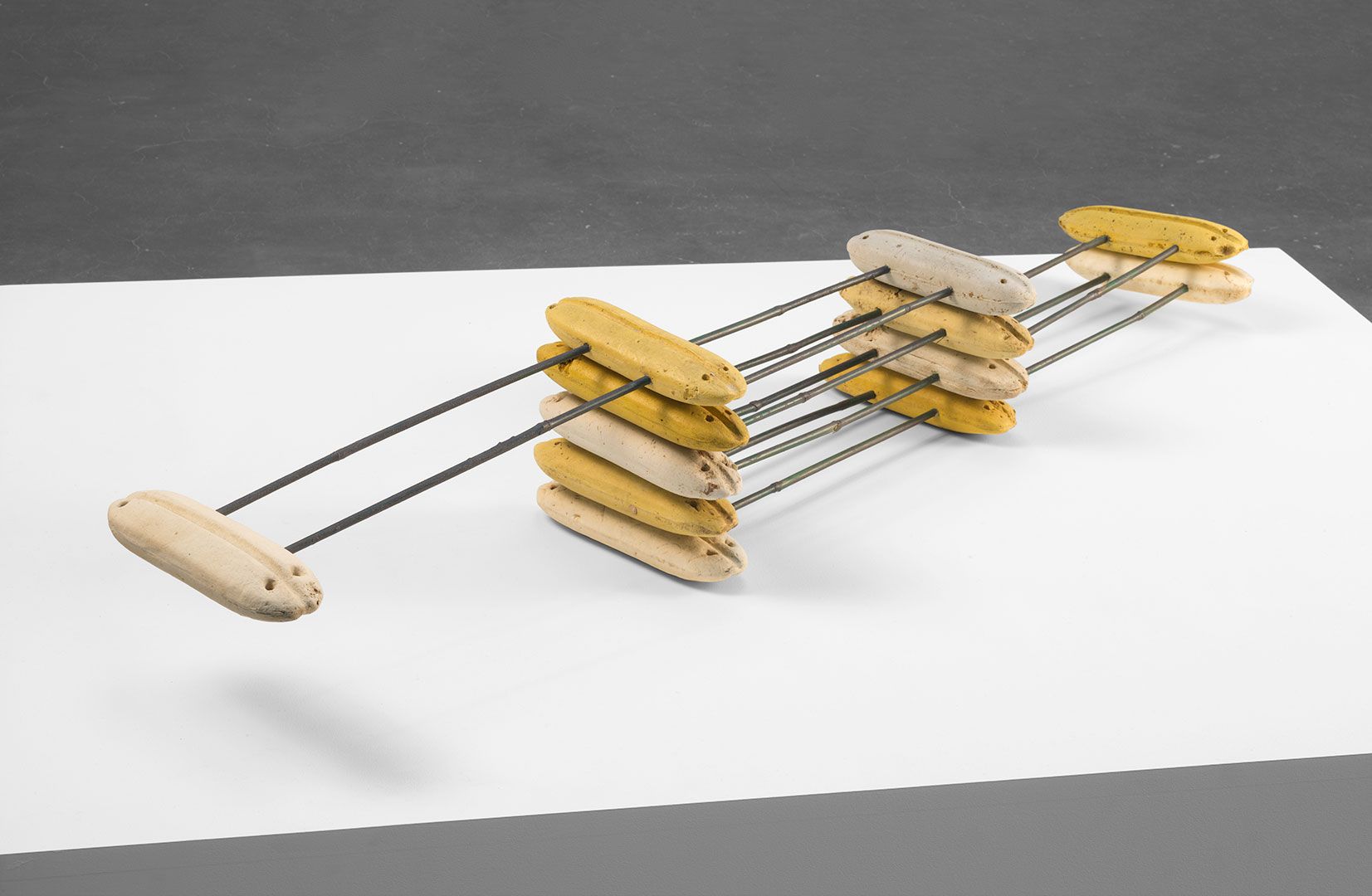 A mixed media sculpture by Al Taylor, titled (3 2 4 1 4 2 3): Counting Without Riggers, dated 1998.