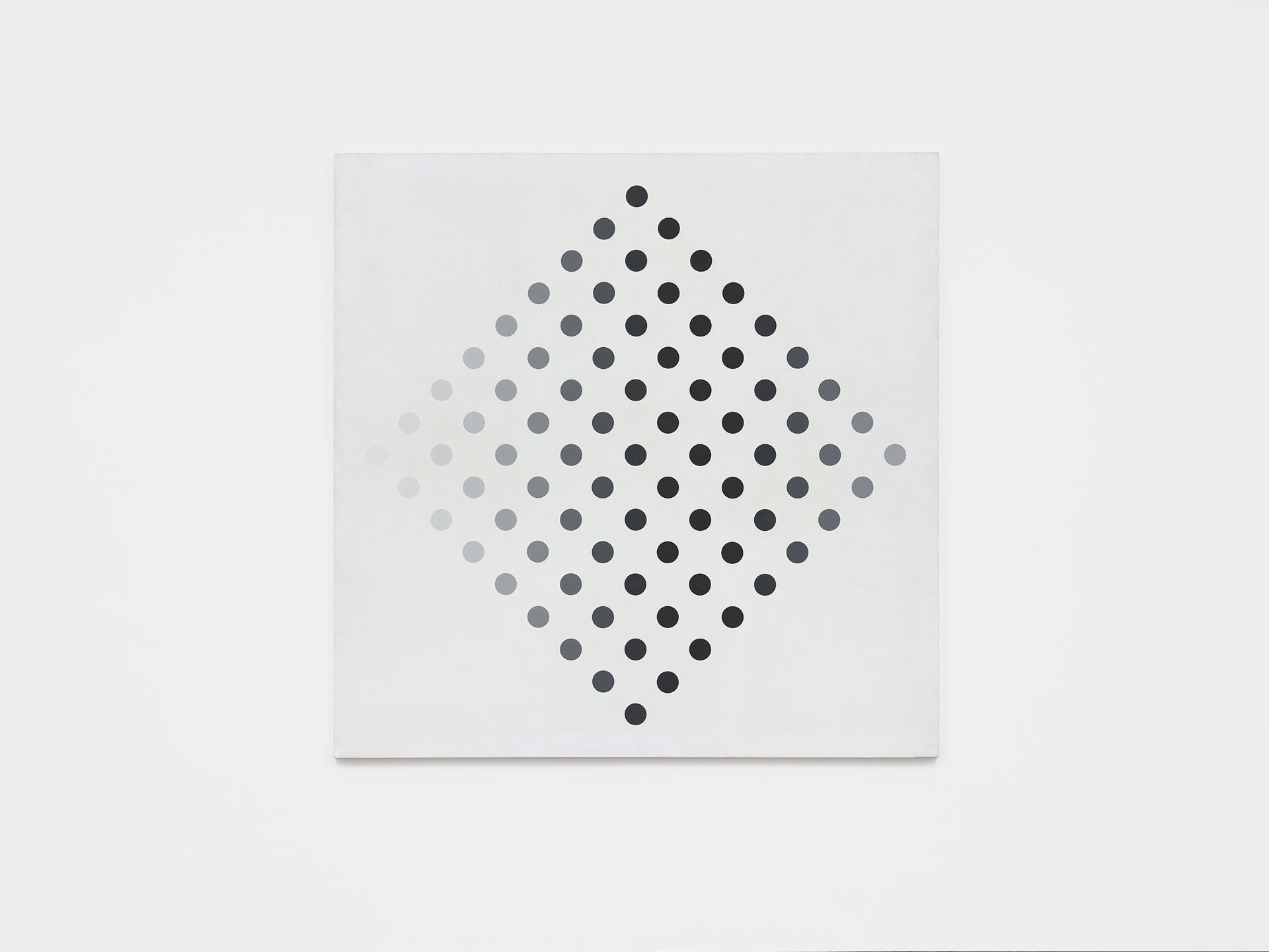 A painting by Bridget Riley, titled Black to White Discs, dated in 1962 and 1965.