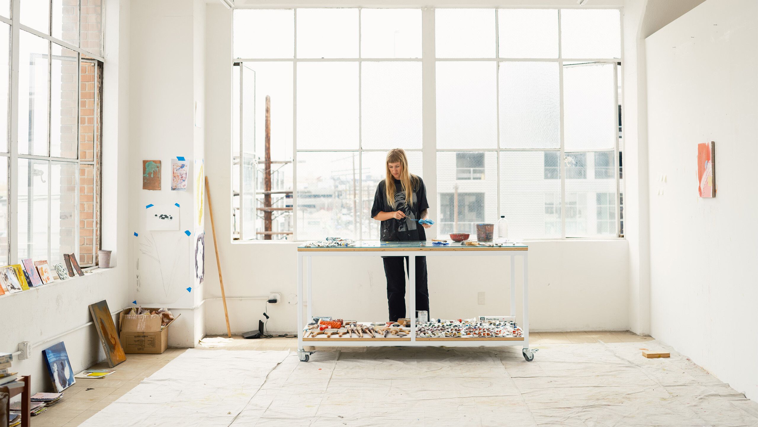 A Photo by Chantal Anderson of Emma McIntyre in her studio in Los Angeles, dated 2023. 