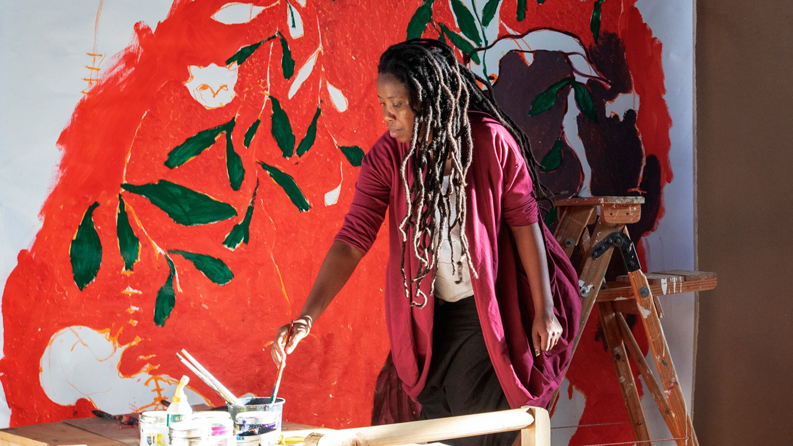 Portia Zvavahera in her studio, dated 2021. Photo by Gianluigi Guercia