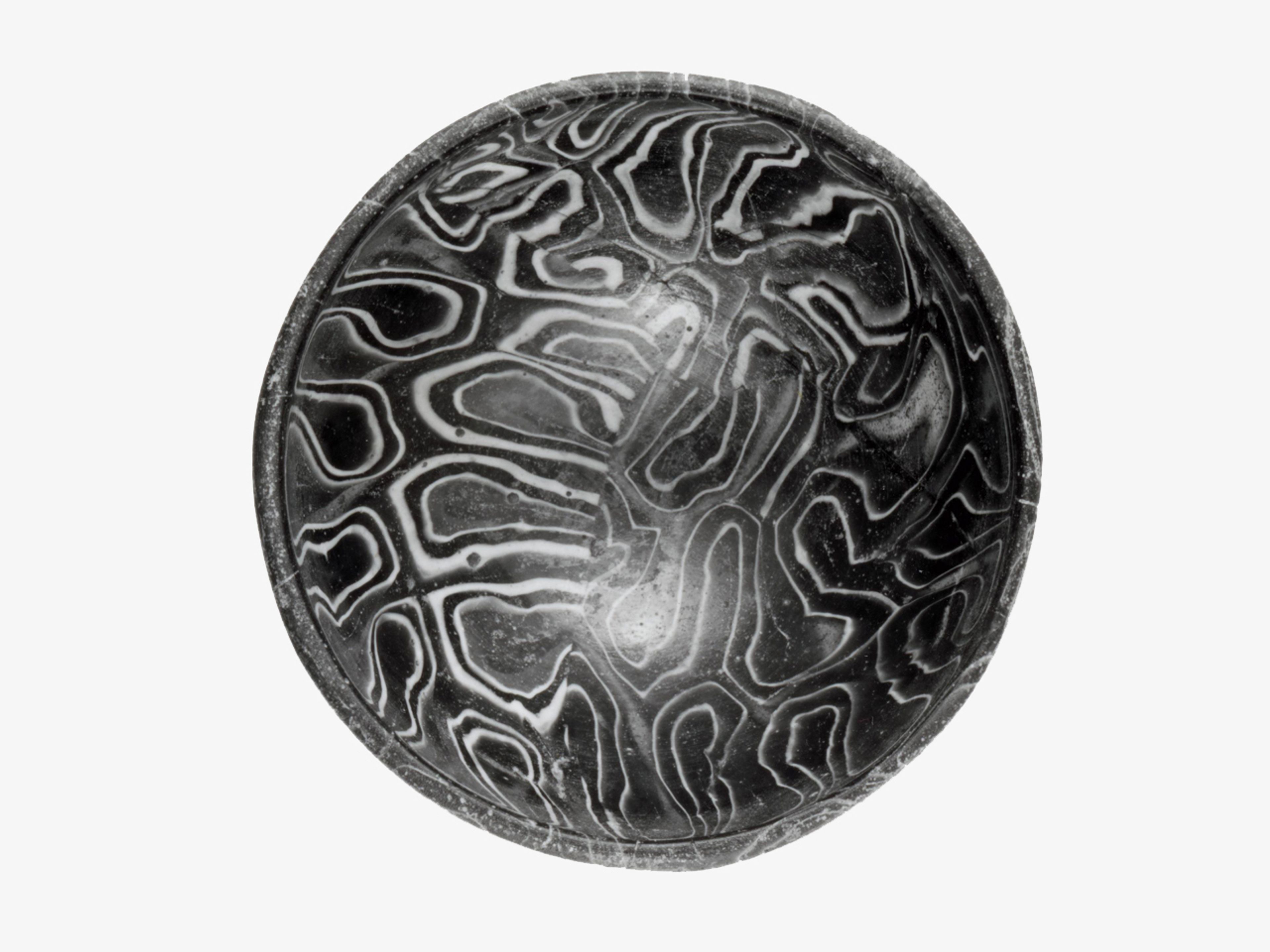 Hemispherical mould-pressed glass mosaic bowl from the Hellenistic period.