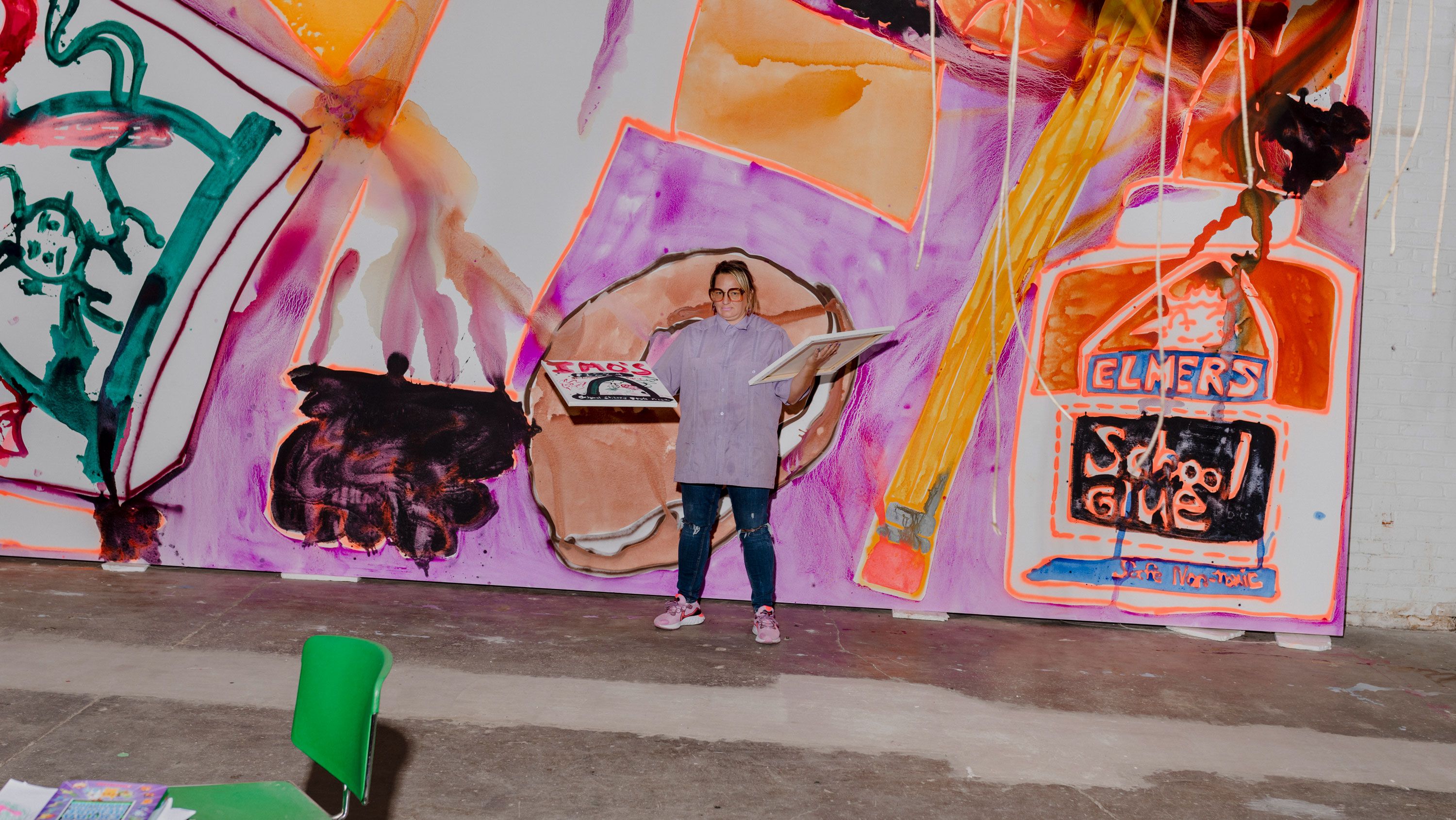 Bernhardt in front of a new 31-foot-long painting. Photo by Lyndon French