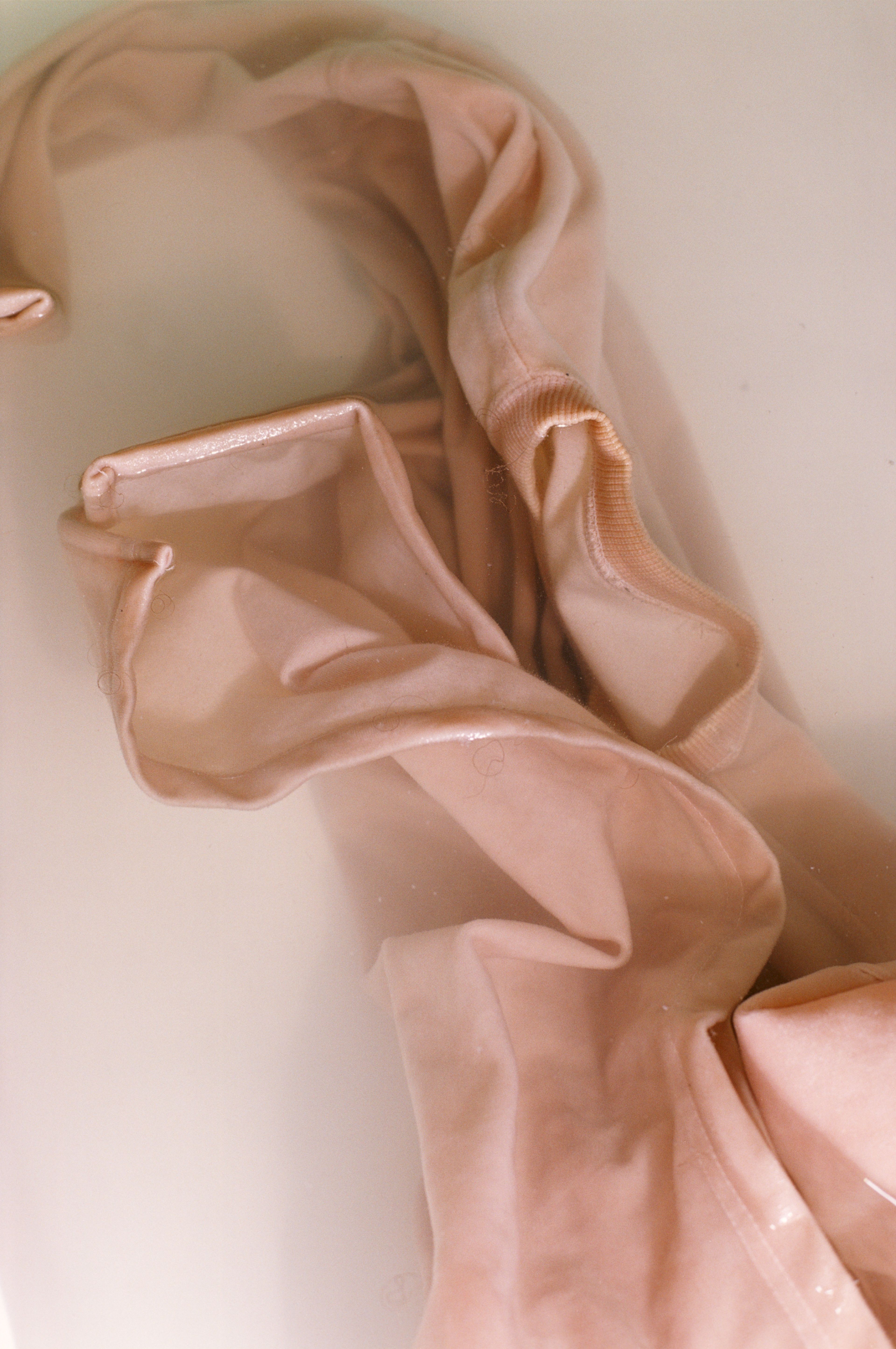 A photograph by Wolfgang Tillmans, titled Faltenwurf (submerged), dated 2000.