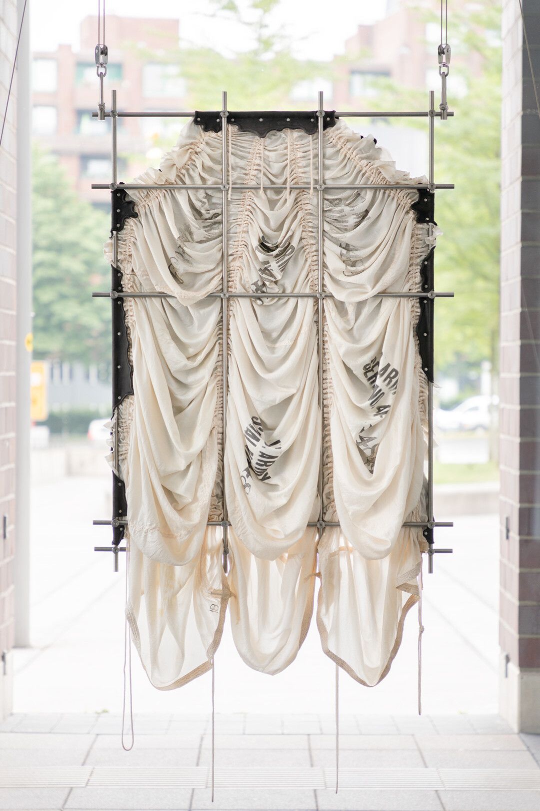 A sculpture by Elaine Cameron-Weir titled the difference between the PILLOW and the PIT at least. Yet. The history of nothing. A see thru..., dated 2018.