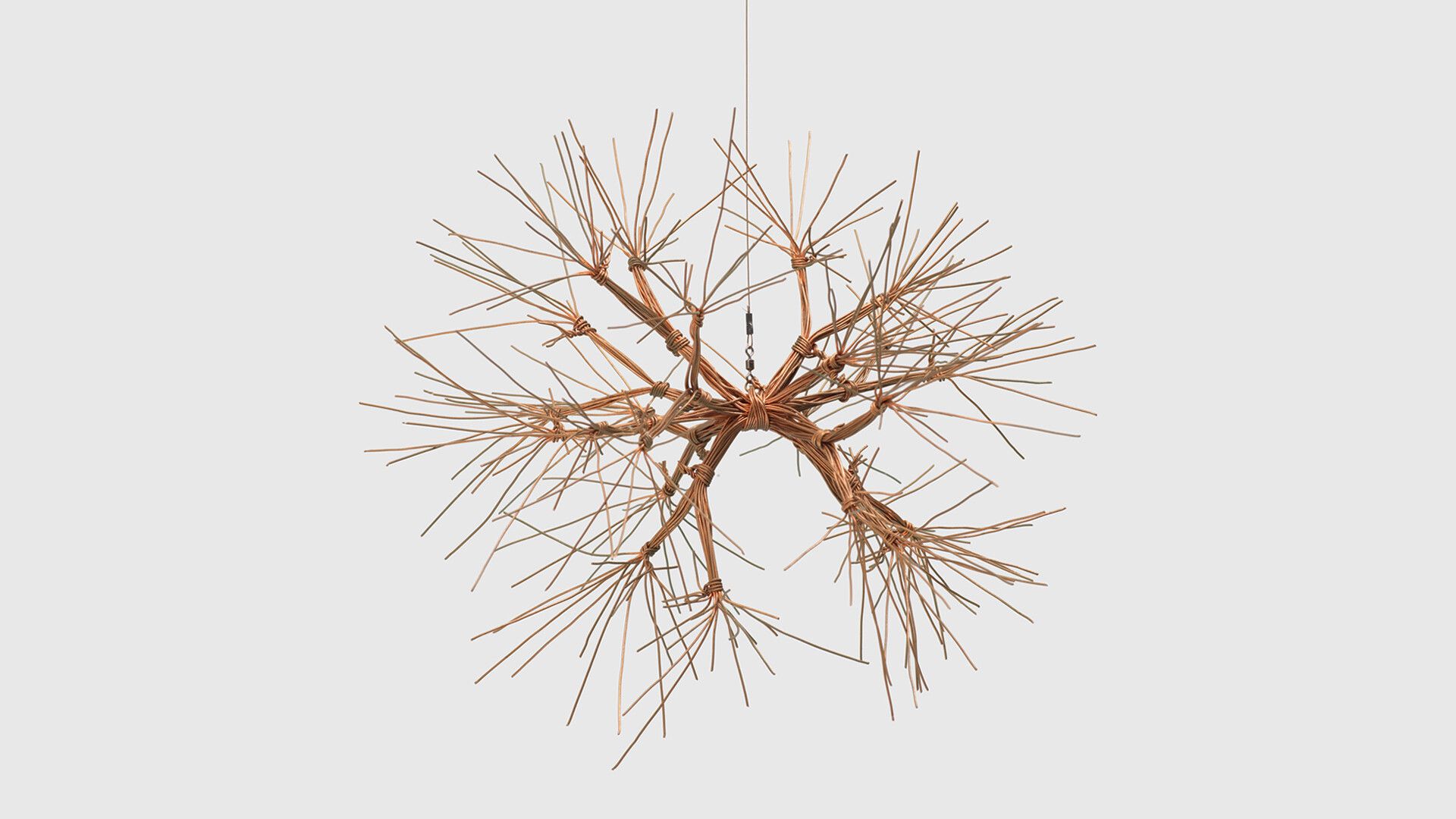 A hanging copper wire sculpture by Ruth Asawa, titled, Untitled (S.764, Hanging Tied-Wire, Closed-Center, Multi-Branched Form Based on Nature), circa 1964 to 1966.
