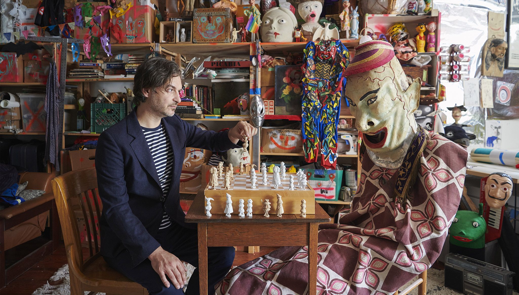 A photograph featuring Marcel Dzama in his Brooklyn studio, 2021. Photo: Jason Schmidt