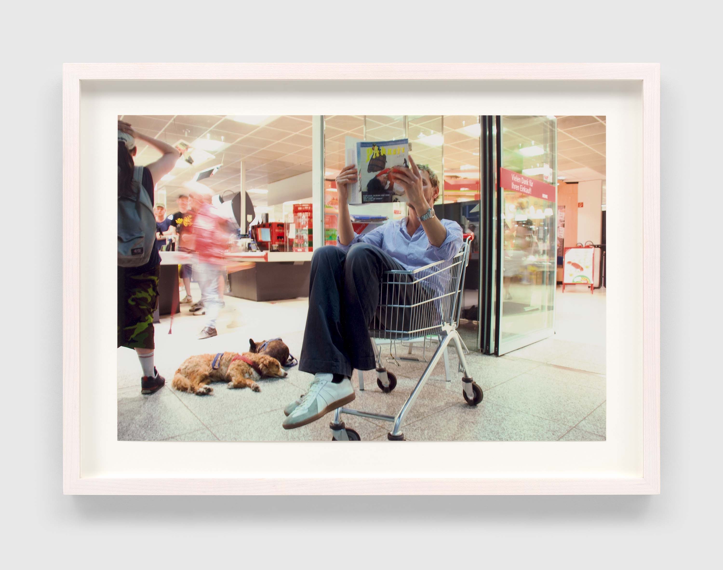 A photograph by Christian Jankowski, titled Christian Jankowski reads Parkett Vol. 67 on Olafur Eliasson, dated in 2007 and 2008.