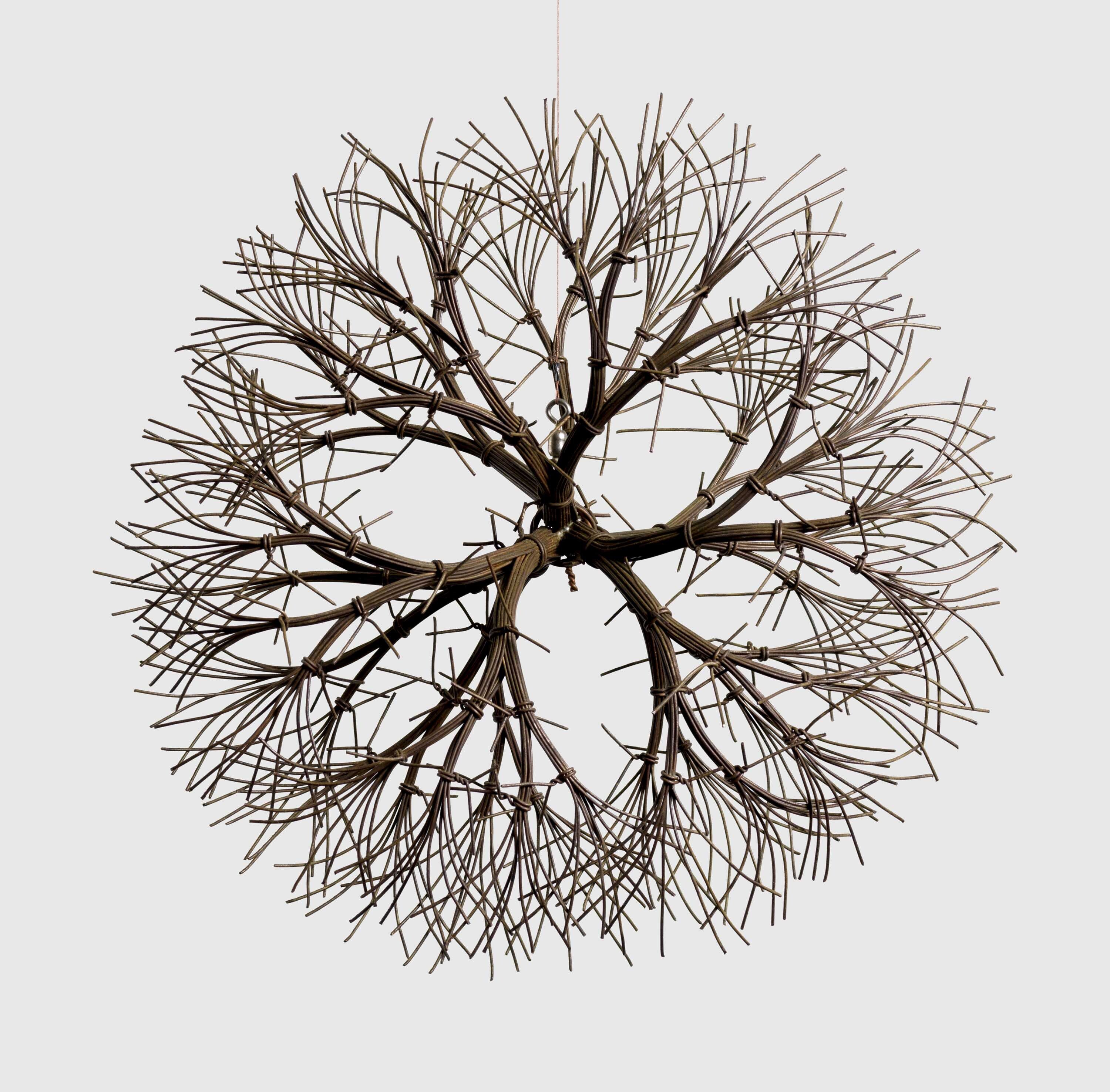 A brass wire sculpture by Ruth Asawa, called Untitled (S.381, Hanging Tied-Wire, Double-Sided, Center-Tied, Three-Branched Form Based on Nature), circa 1965.