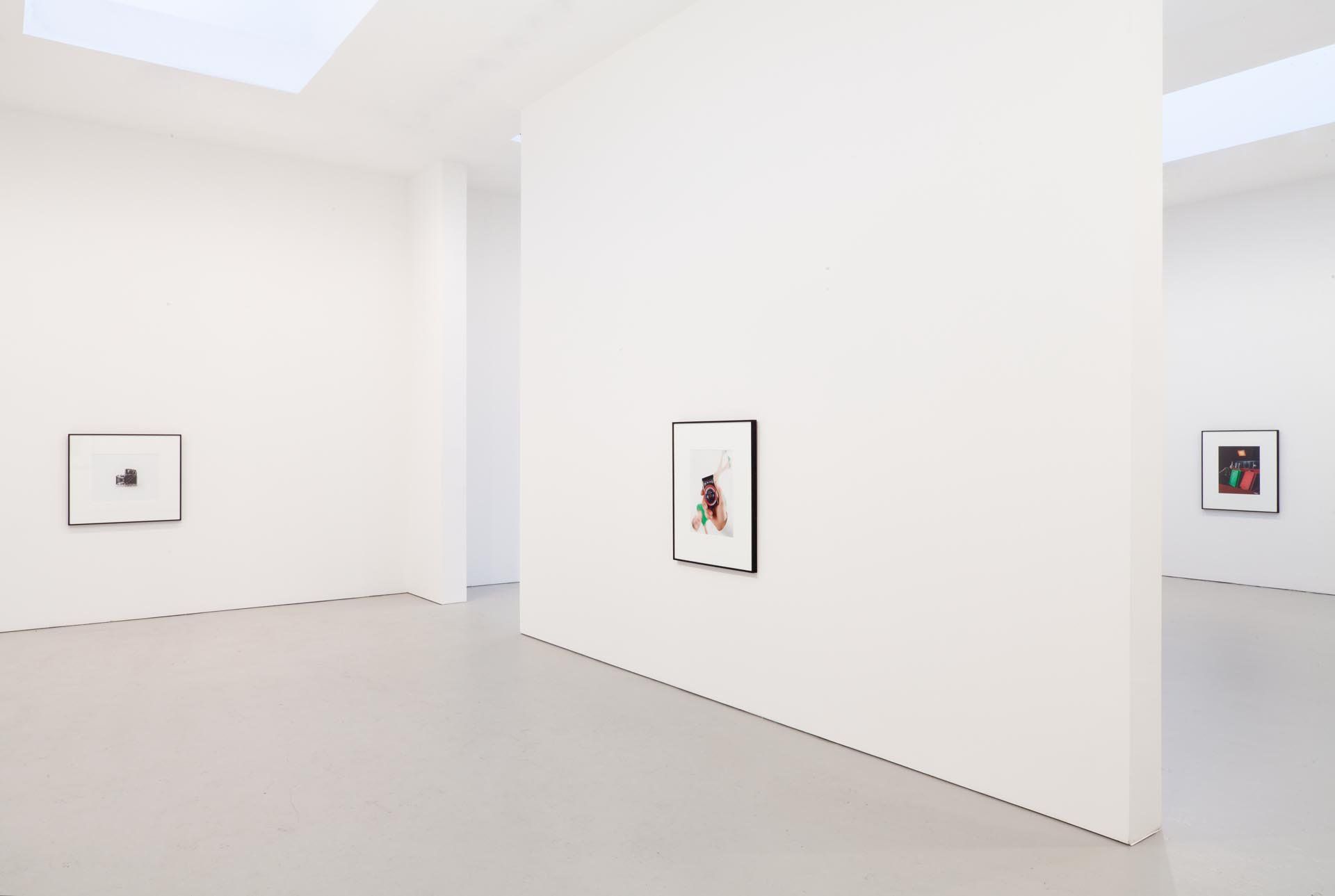 Installation view of the exhibition Christopher Williams For Example: Dix-Huit Leçons Sur La Société Industrielle (Revision 12), at David Zwirner in New York, dated 2011.