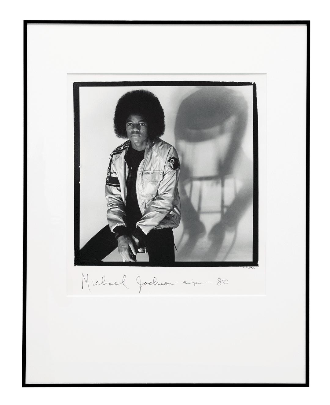 A photograph by Anthony Barboza, titled Michael Jackson at 21, dated 1980.