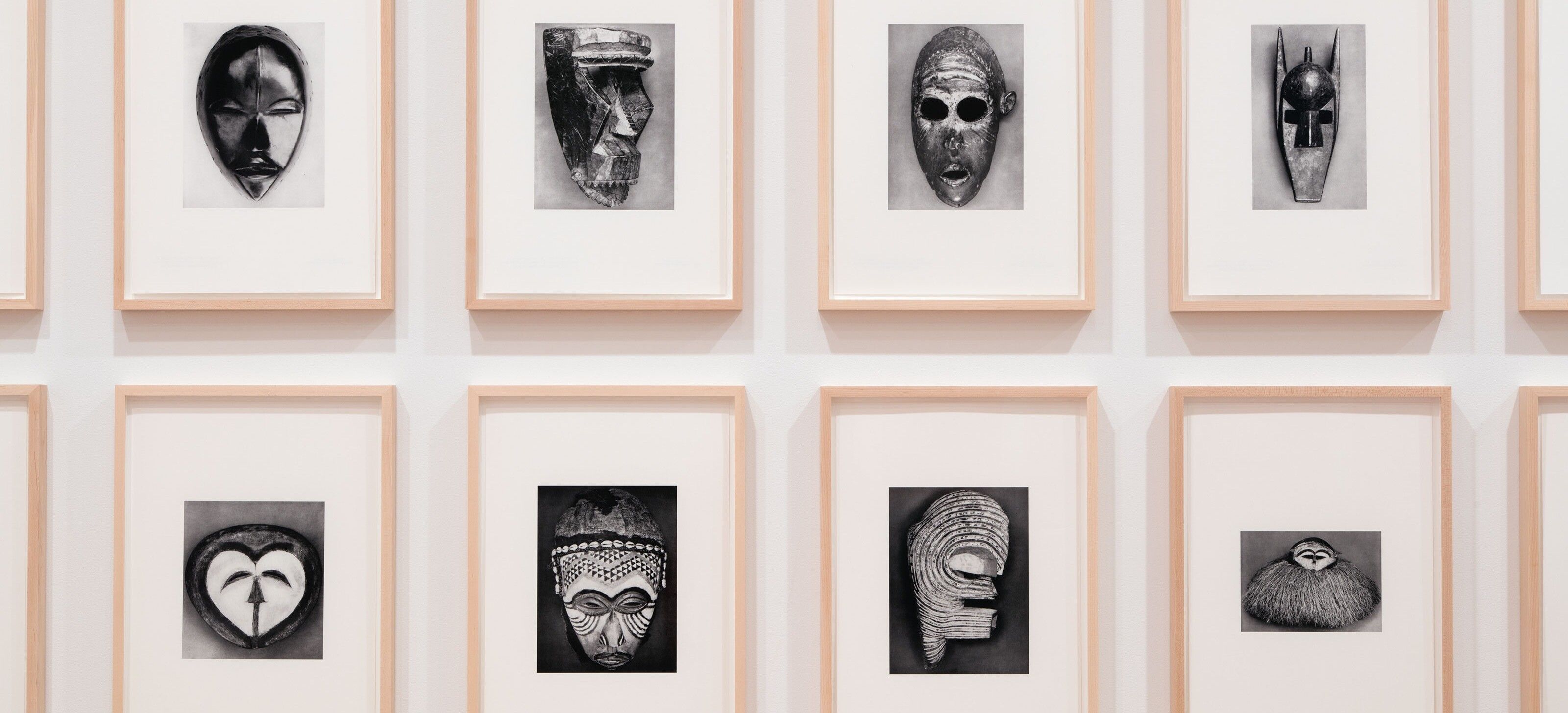 A detail of African Masks After Walker Evans: 1–24, by Sherrie Levine, made of twenty-four glicée inkjet prints, dated 2014.