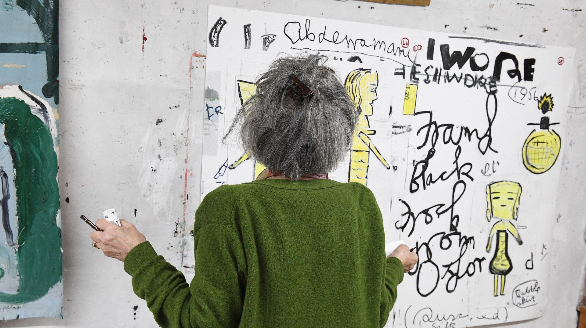 A photograph of Rose Wylie in her studio, dated 2019