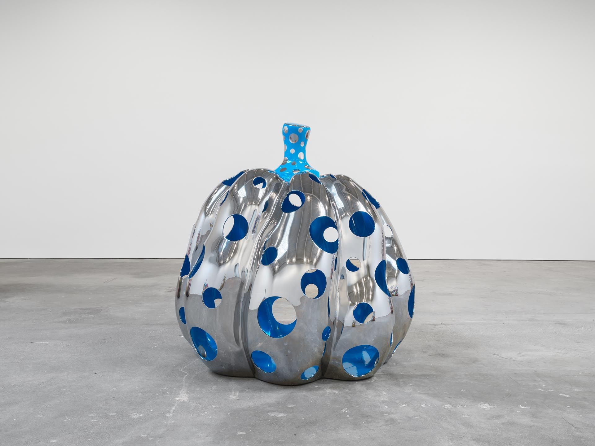 A sculpture by Yayoi Kusama, titled PUMPKIN, dated 2015.