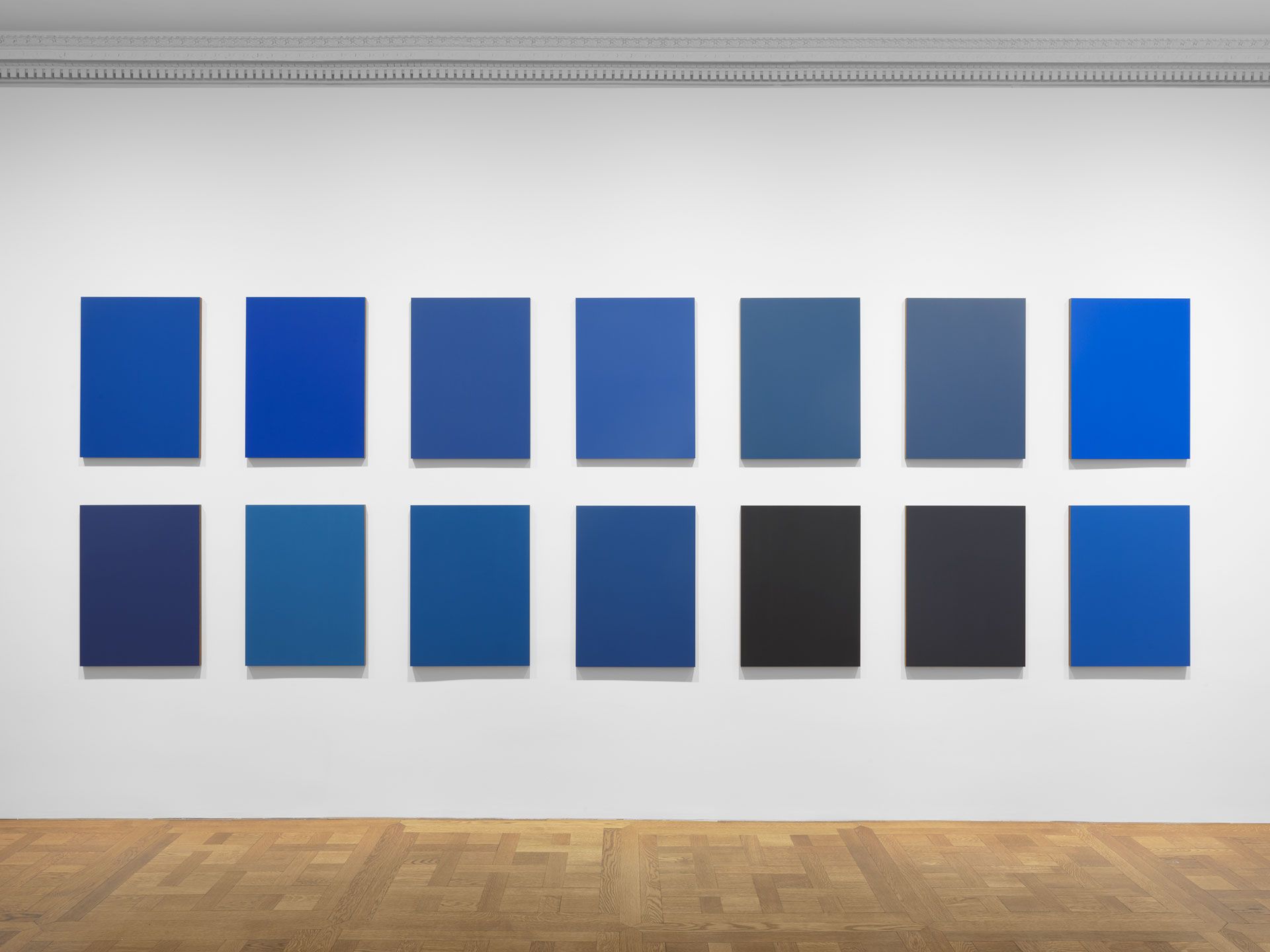 A fourteen part painting by Sherrie Levine, titled Monochromes After Reinhardt: 15-28, dated 2018.