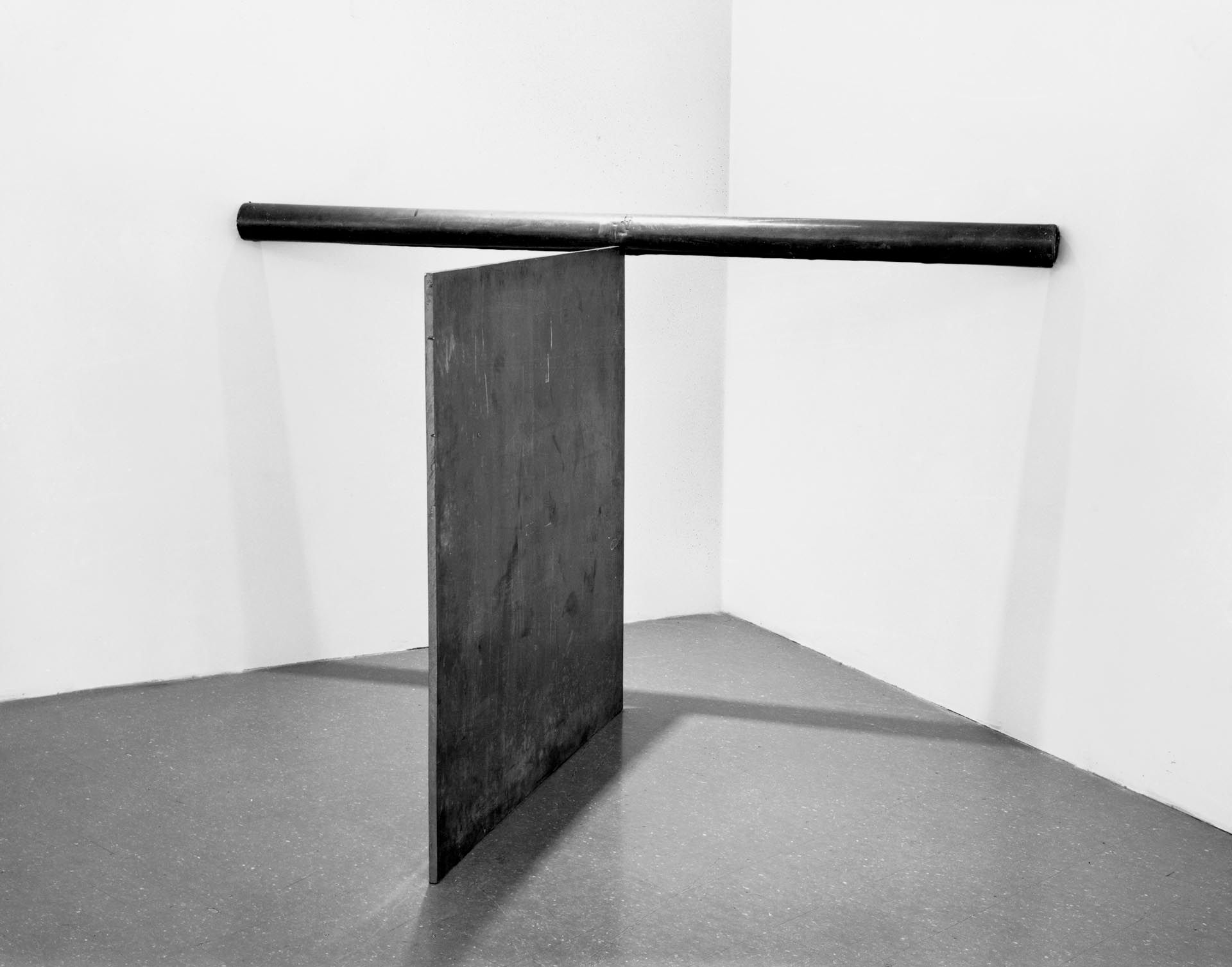 A lead sculpture by Richard Serra, titled Equal (Corner Prop Piece), dated 1969 to 1970.