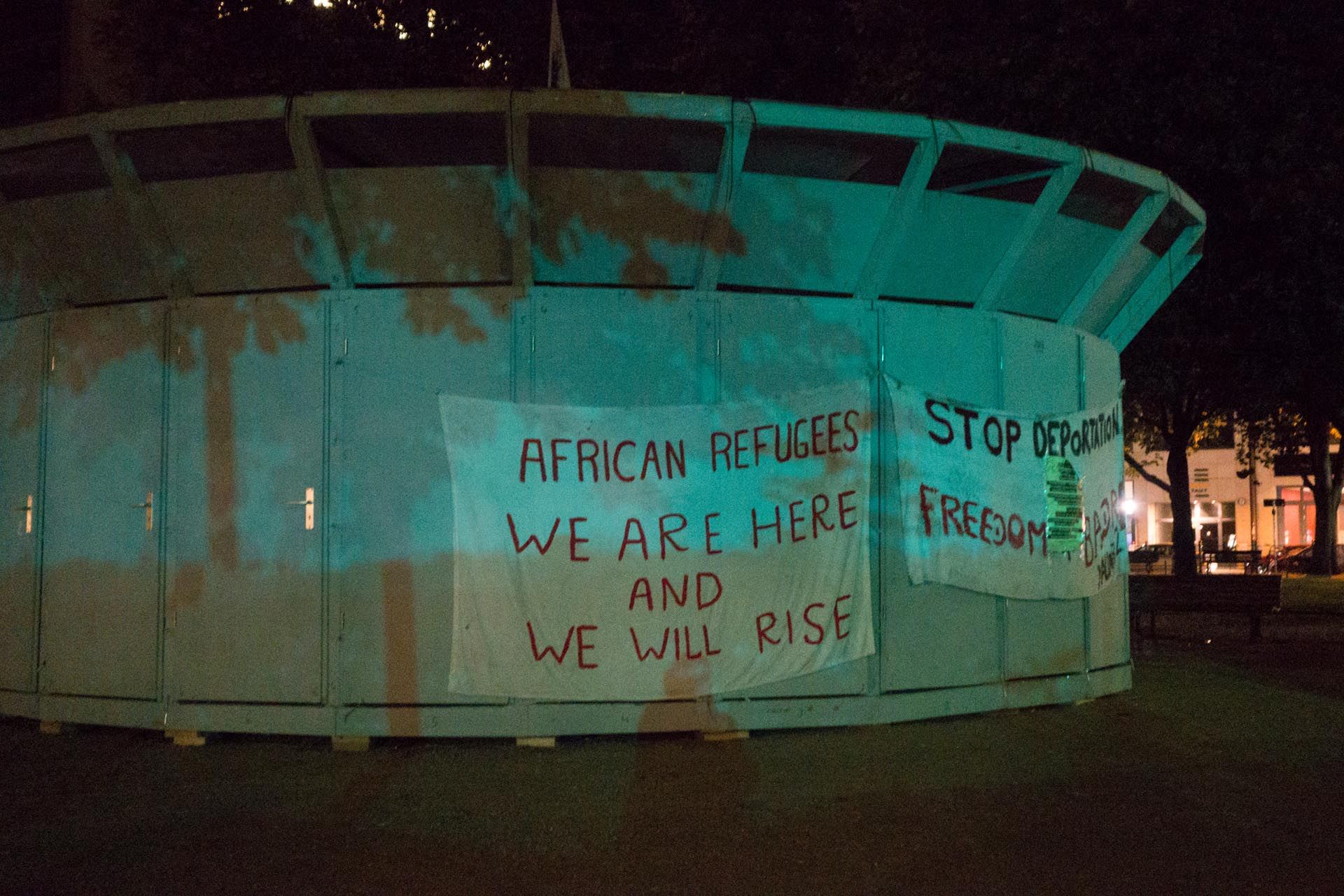 A photograph by Wolfgang Tillmans, titled Oranienplatz pavilion (pre-arson‚Äã), dated 2014.