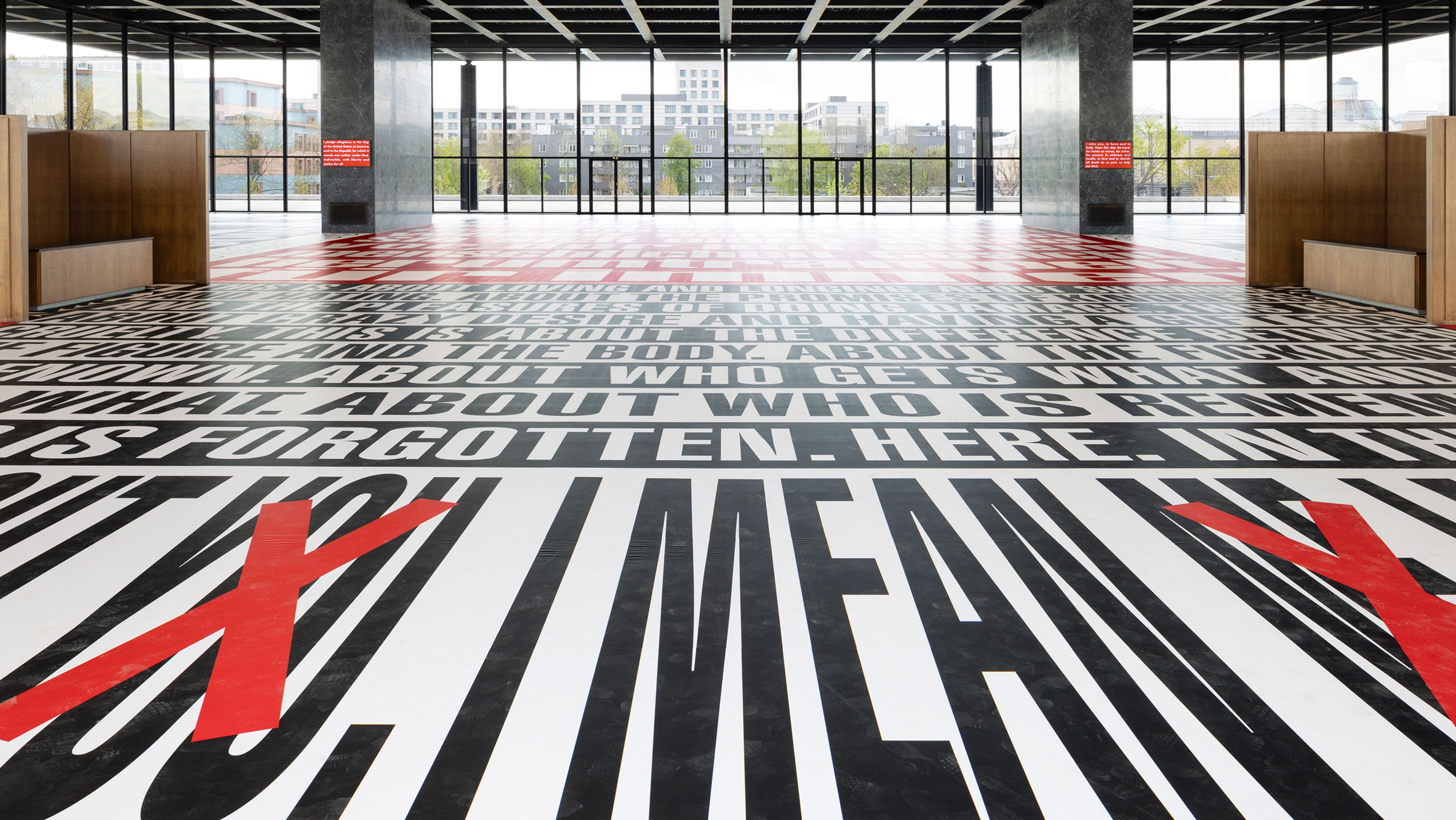 Installation view of the exhibition, Barbara Kruger: Bitte lachen / Please cry, at Neue Nationalgalerie in Berlin, dated 2022.