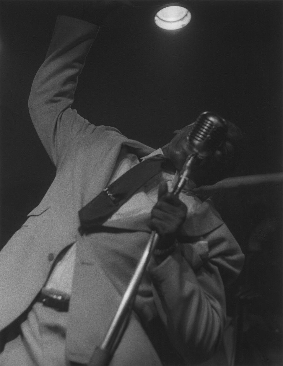 A silver gelatin print by Roy DeCarava, titled Soul singer, dated 1954.