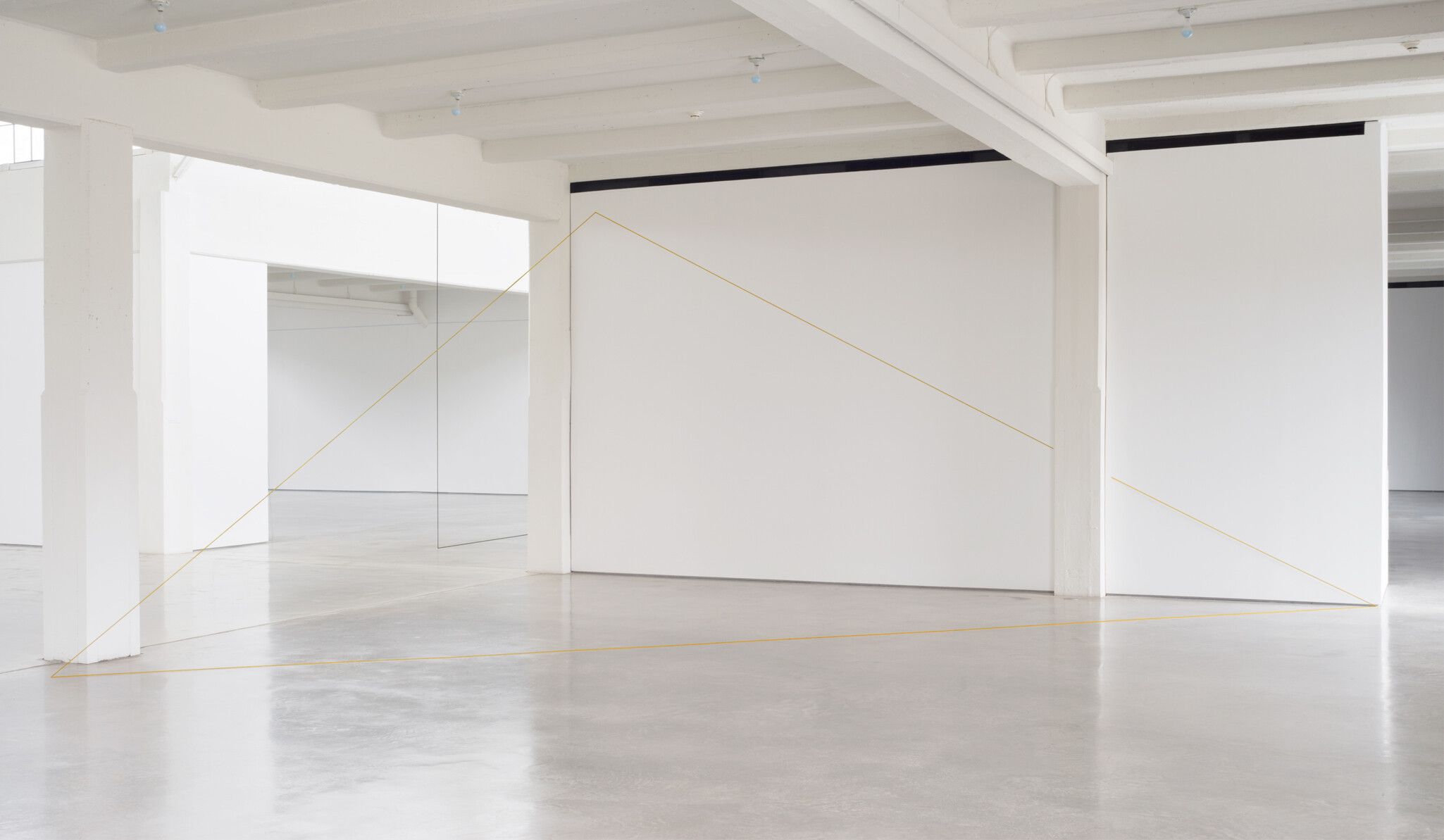 An installation view of a work by Fred Sandback at Dia Beacon