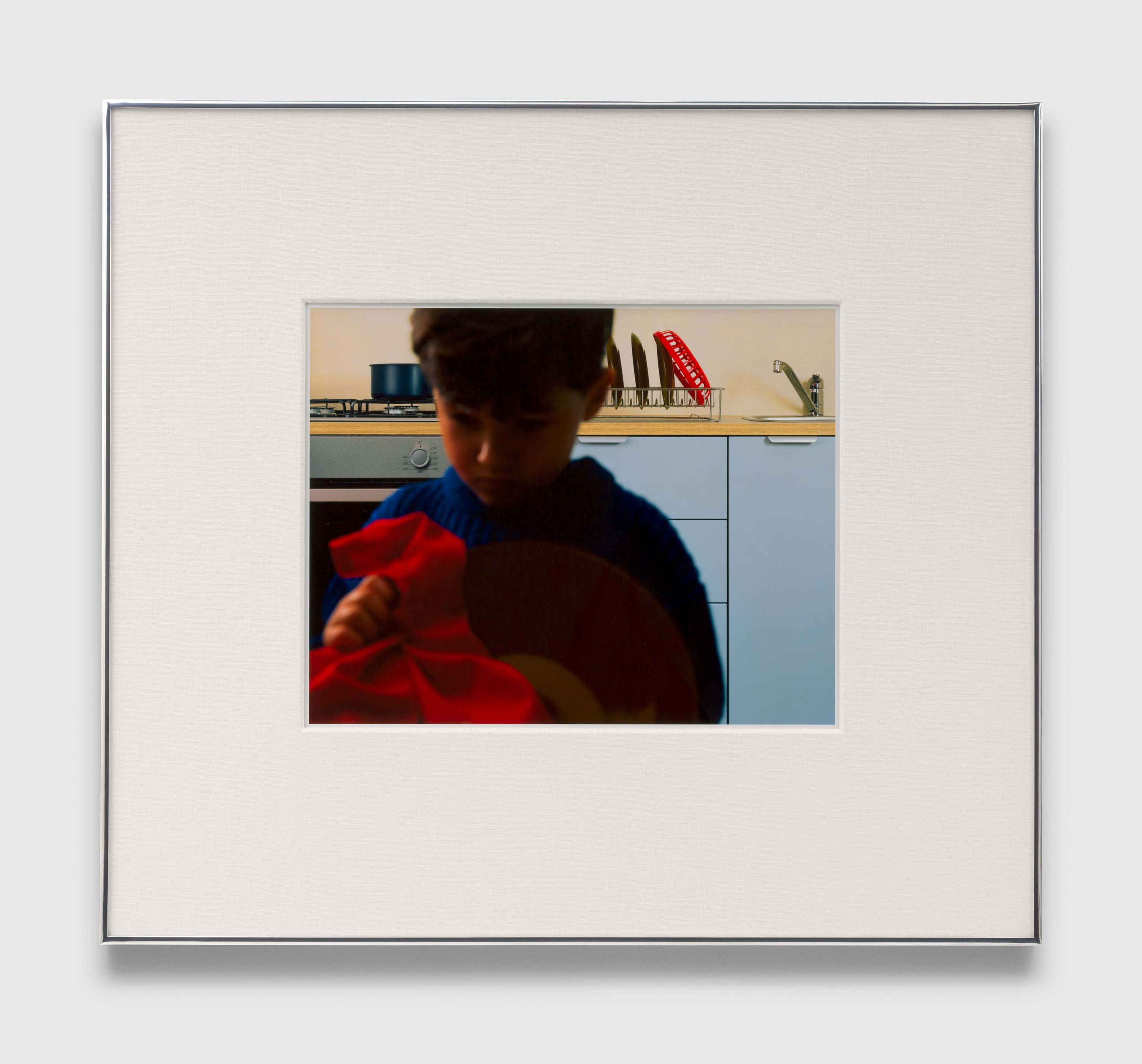 A photograph by Christopher Williams, titled Blocking Template: Ikea Kitchen (Frontal) Studio Thomas Borho, Oberkasseler Str. 39, Düsseldorf, Germany September 18, 2022, dated 2023.