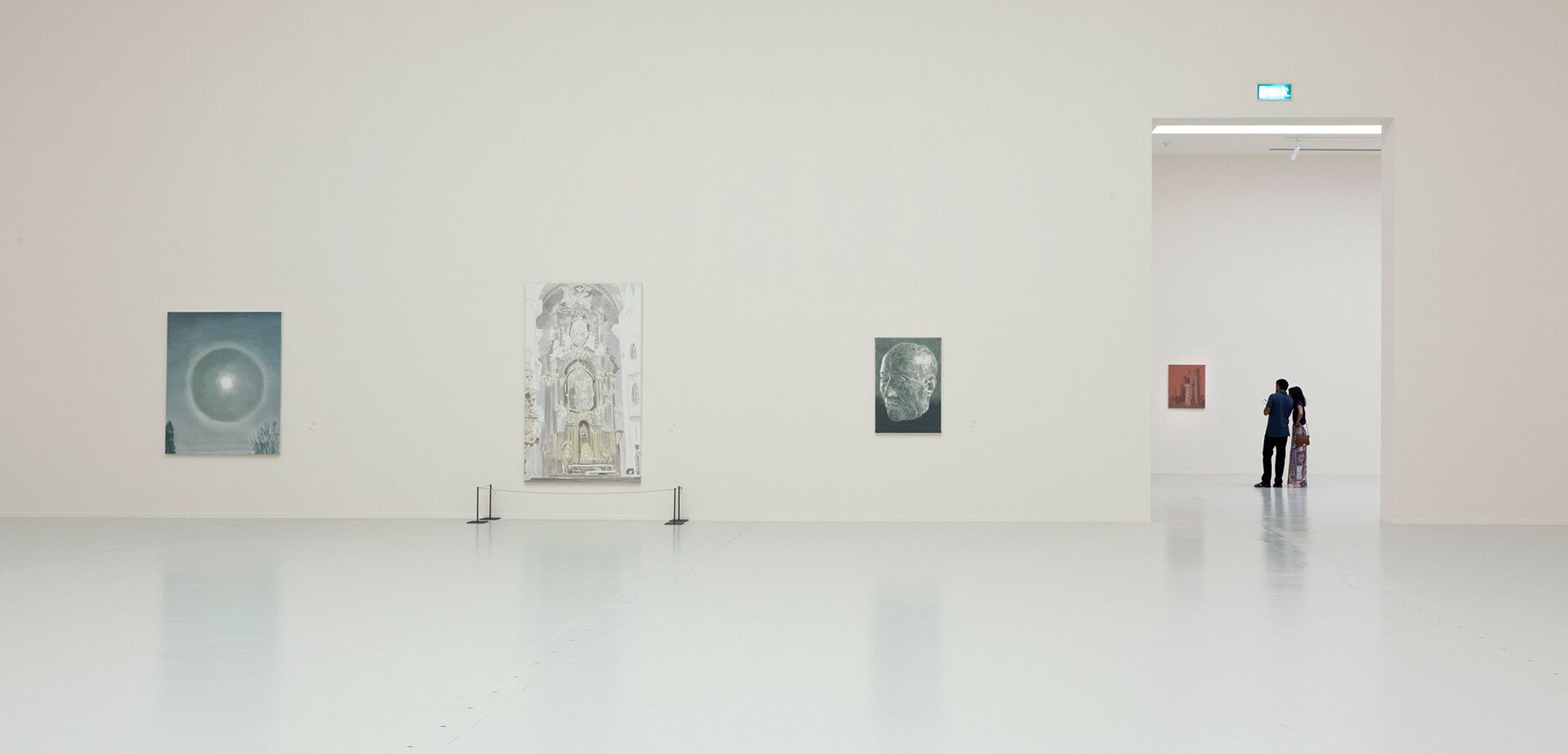 An installation view of an exhibition titled Luc Tuymans: Intolerance, at Qatar Museums Gallery ALRIWAQ in 2015.