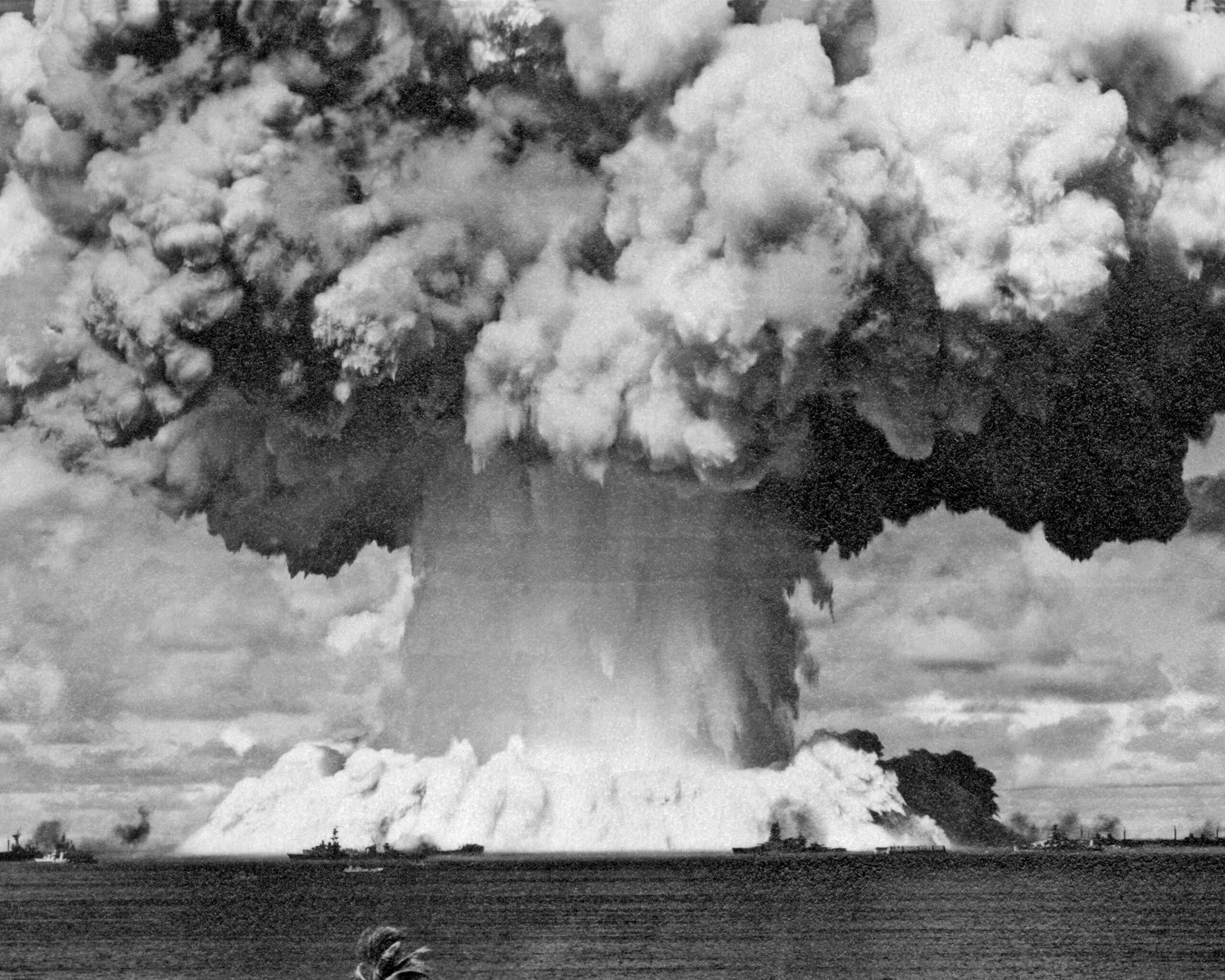 This image depicts a nuclear blast in Bikini Atoll, Marshall Islands, dated July 1, 1946